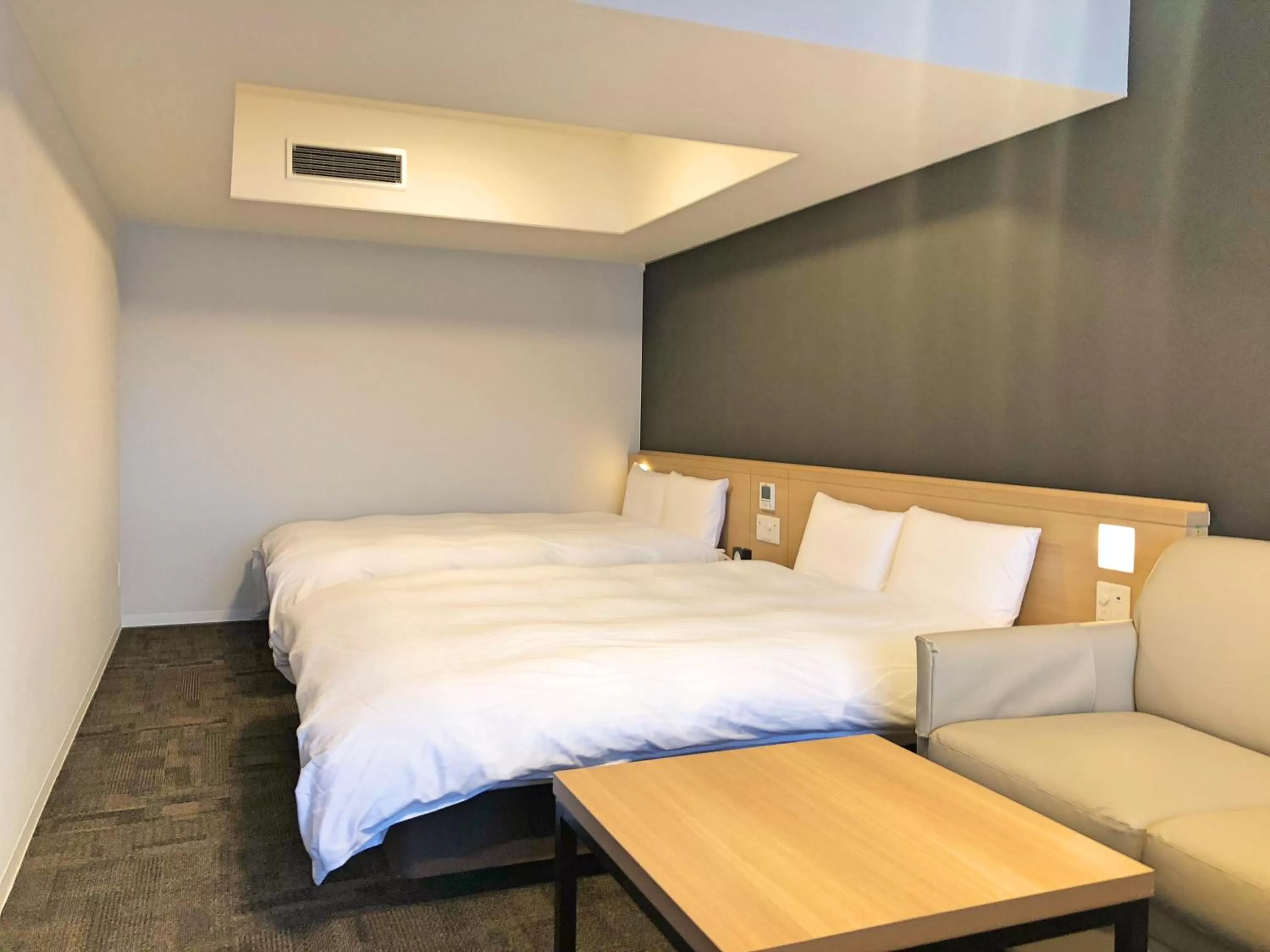 Bed in La Vista Furano Hills Natural Hot Spring