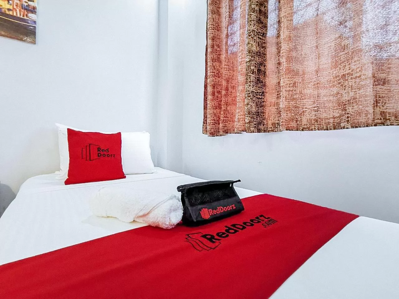 Bed in RedDoorz near Notre Dame of Dadiangas University