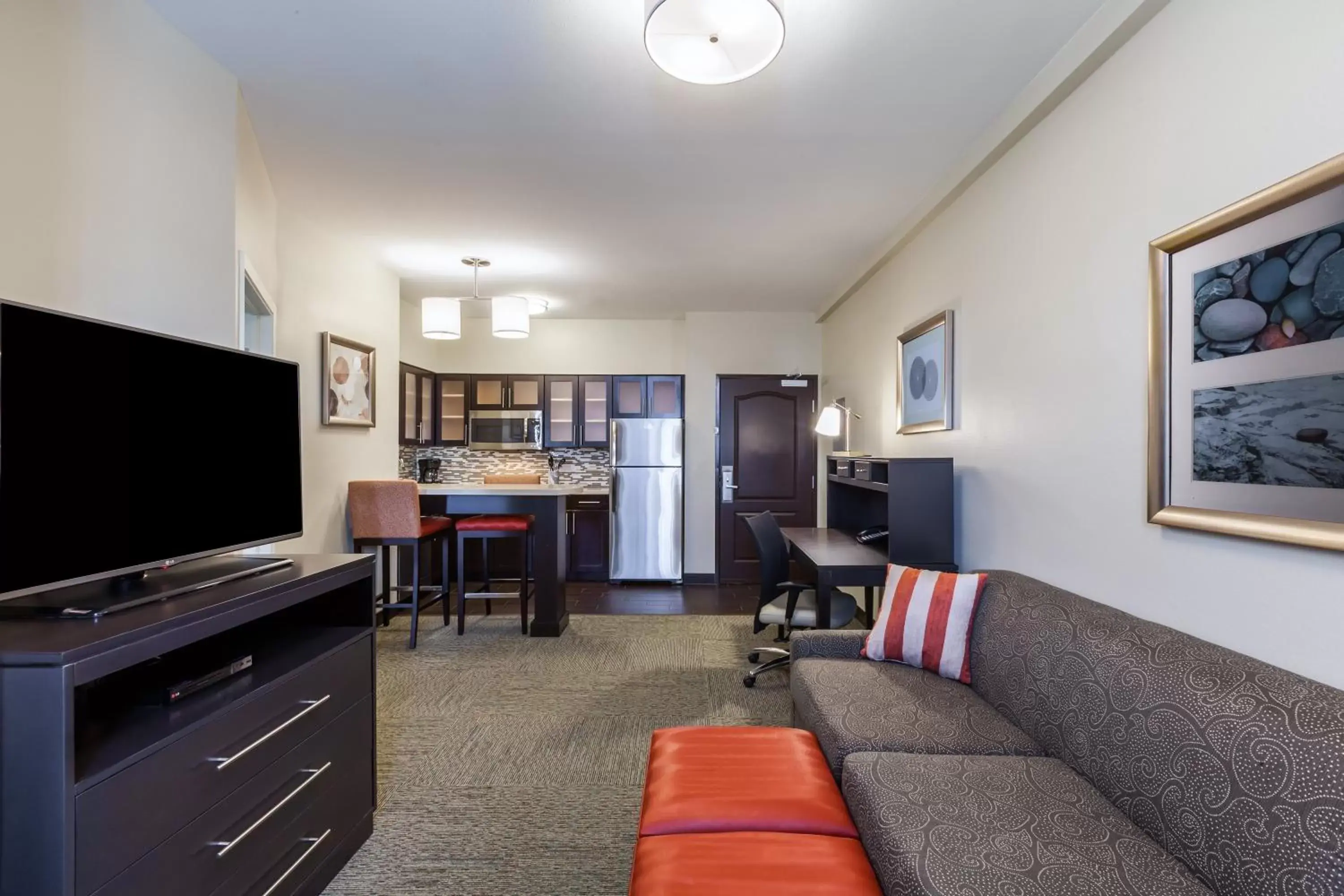 Photo of the whole room, TV/Entertainment Center in Staybridge Suites Fort Worth Fossil Creek, an IHG Hotel