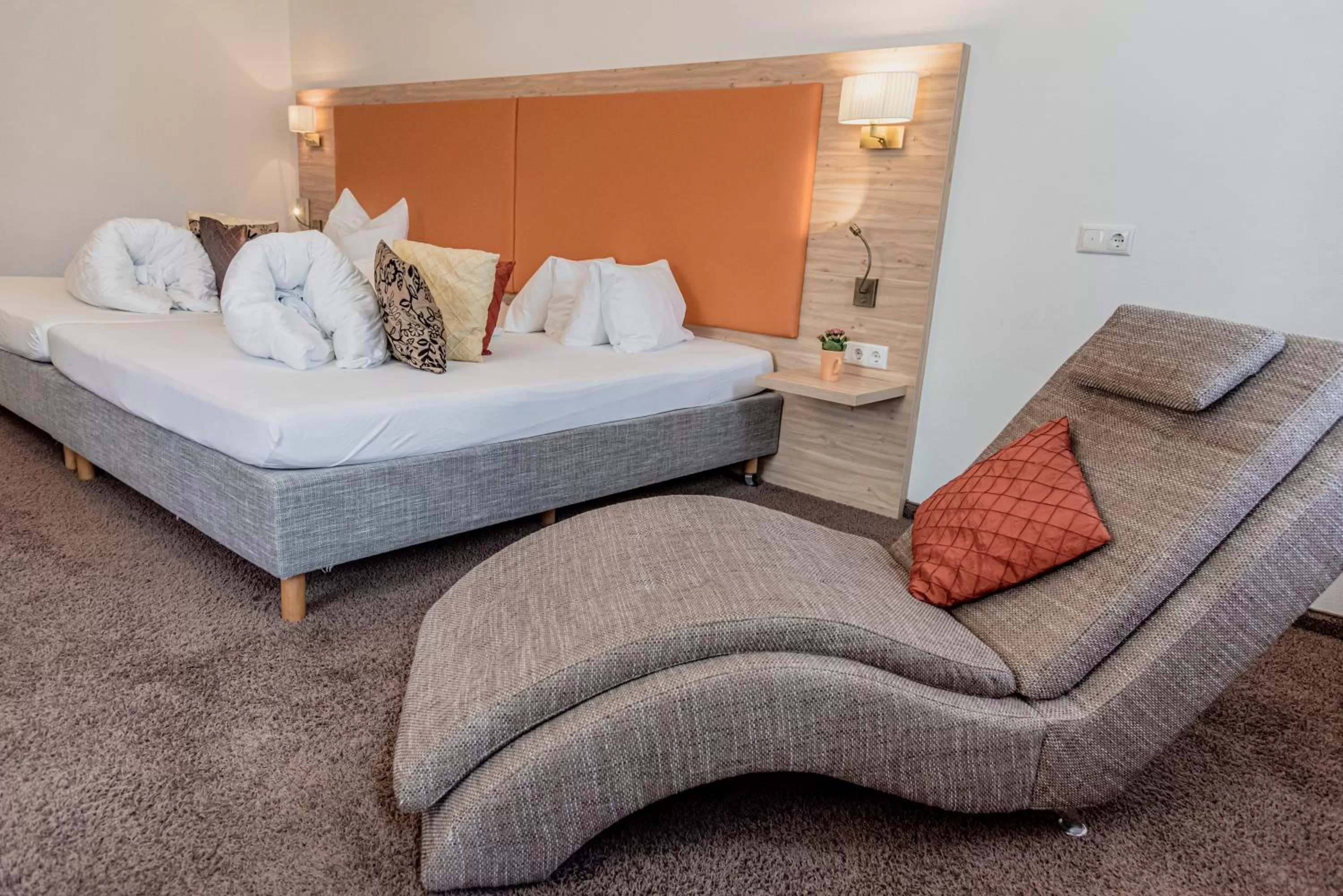 Bed in Wohlfühlhotel Goiserer Mühle