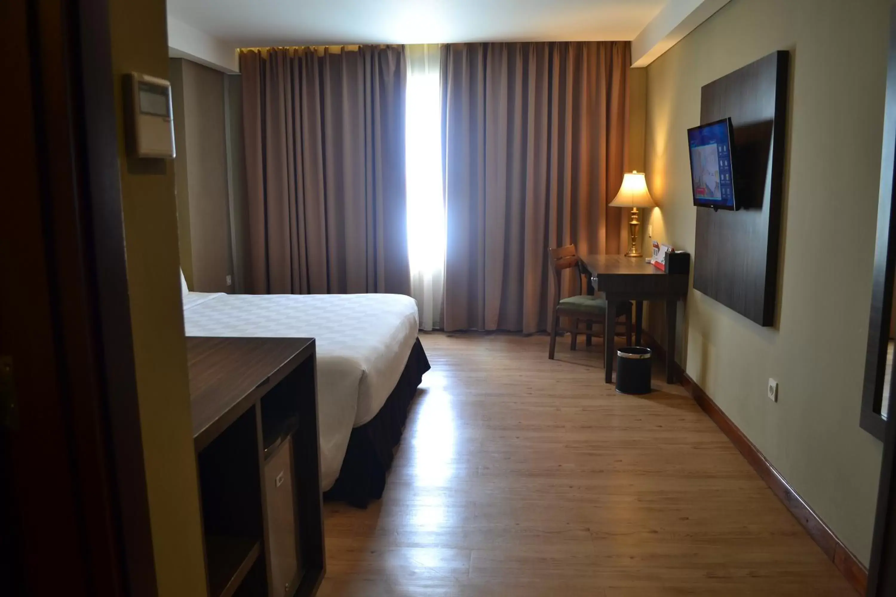 Photo of the whole room, Bed in Swiss-Belhotel Pangkalpinang