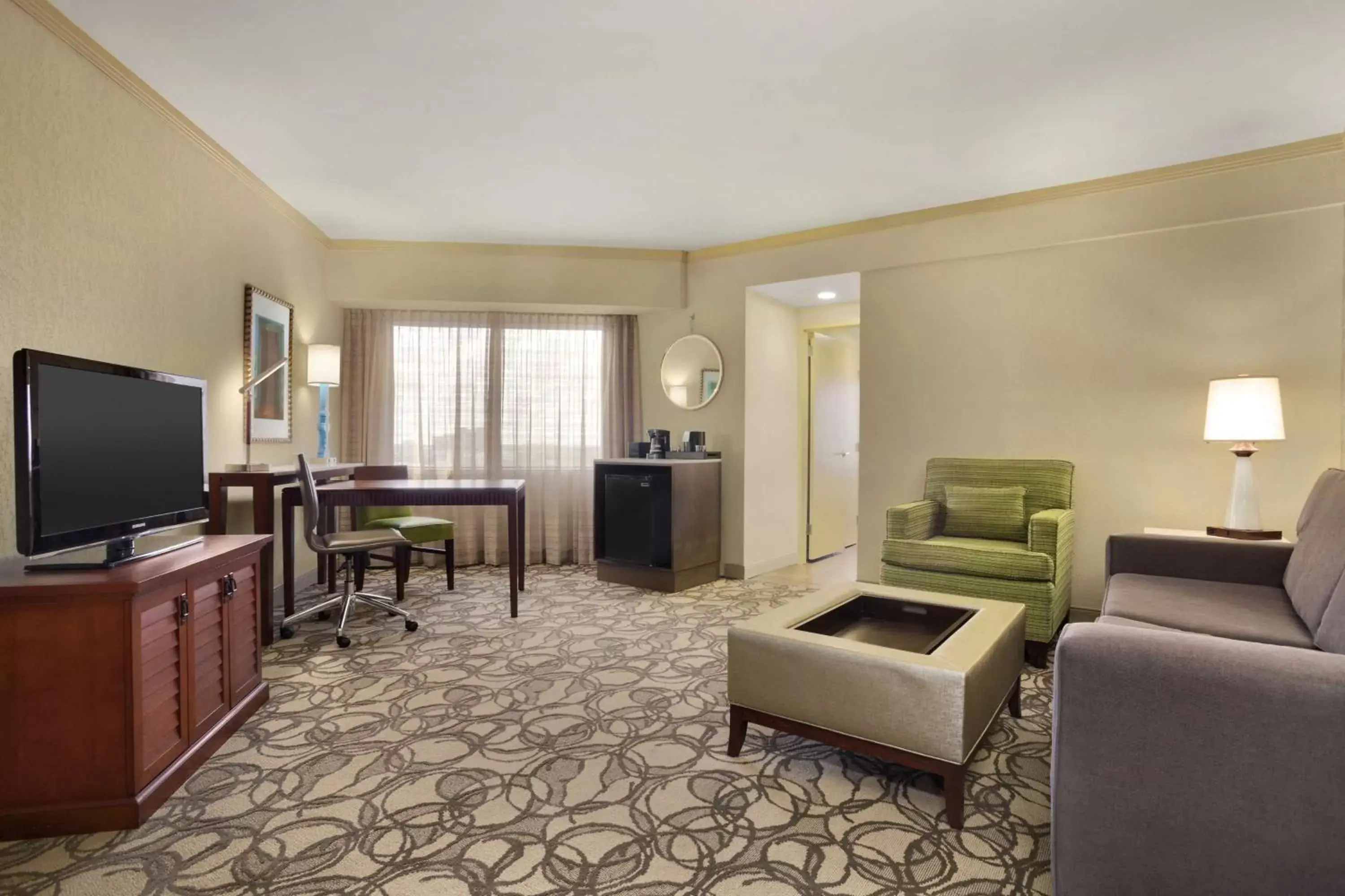 Living room, TV/Entertainment Center in Embassy Suites San Antonio Airport