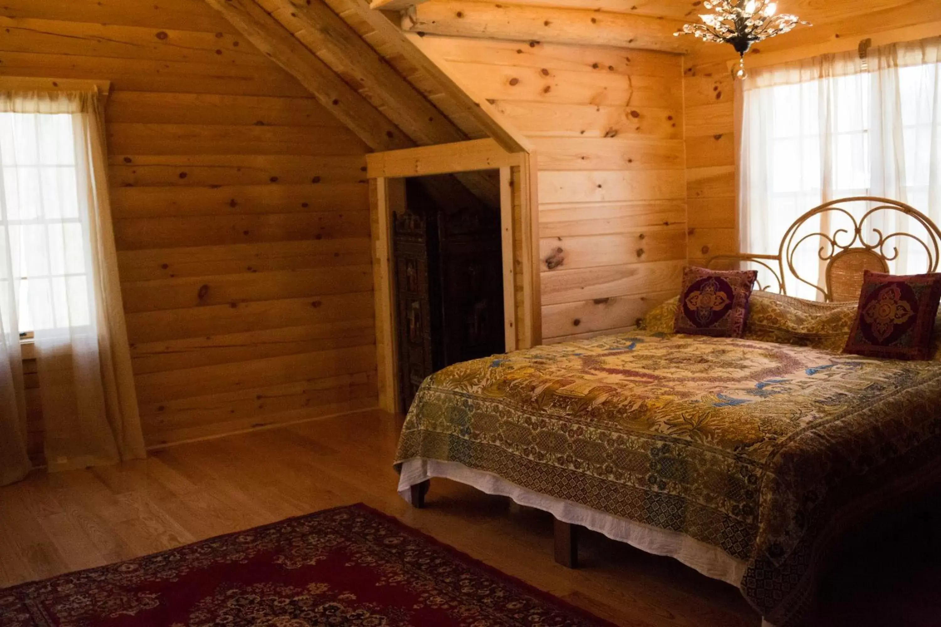 Bed in Log Country Inn Bed and Breakfast of Ithaca