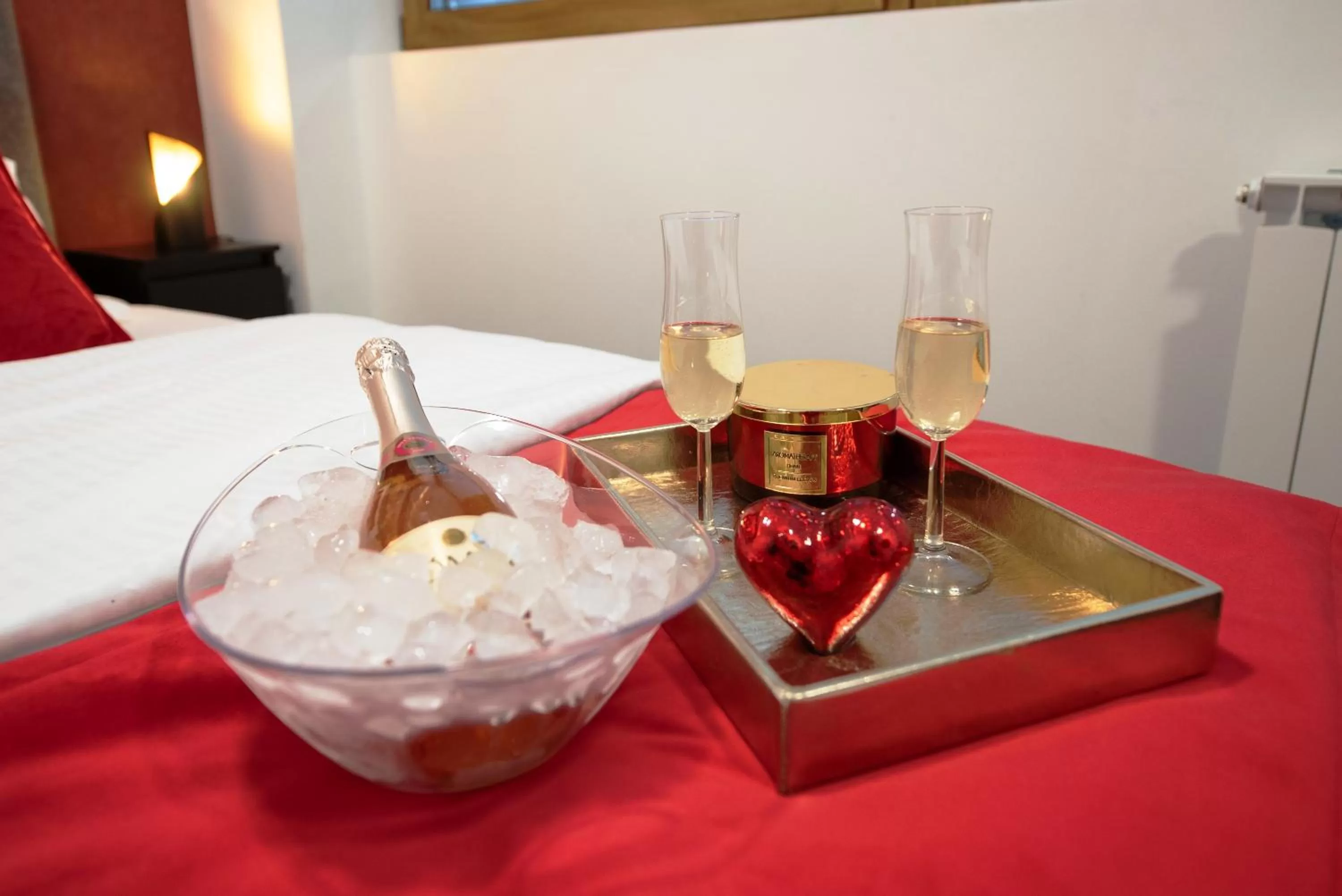 Bed in Arcobaleno Apartments & Rooms