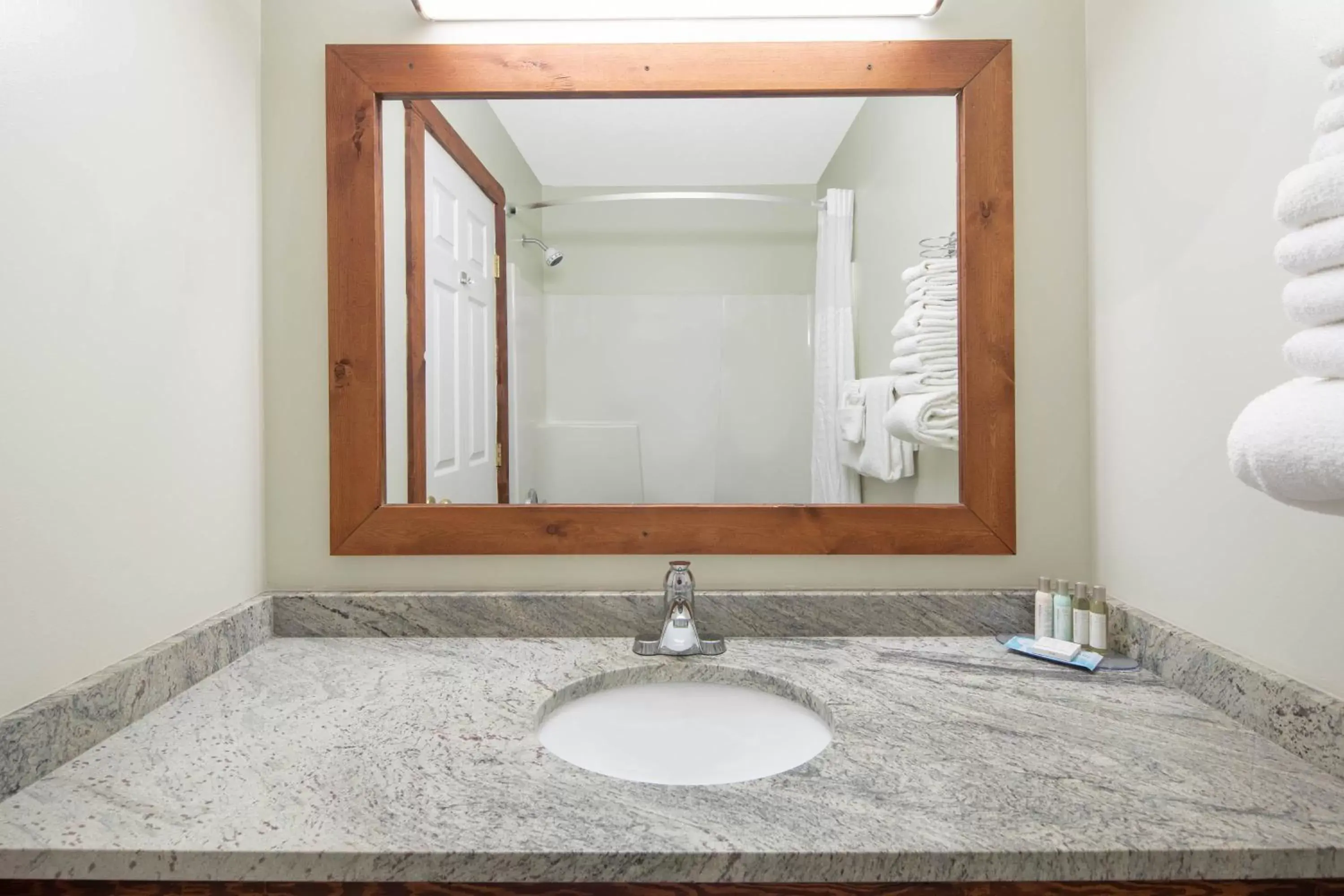 Bathroom in Travelodge by Wyndham Golden Sportsman Lodge