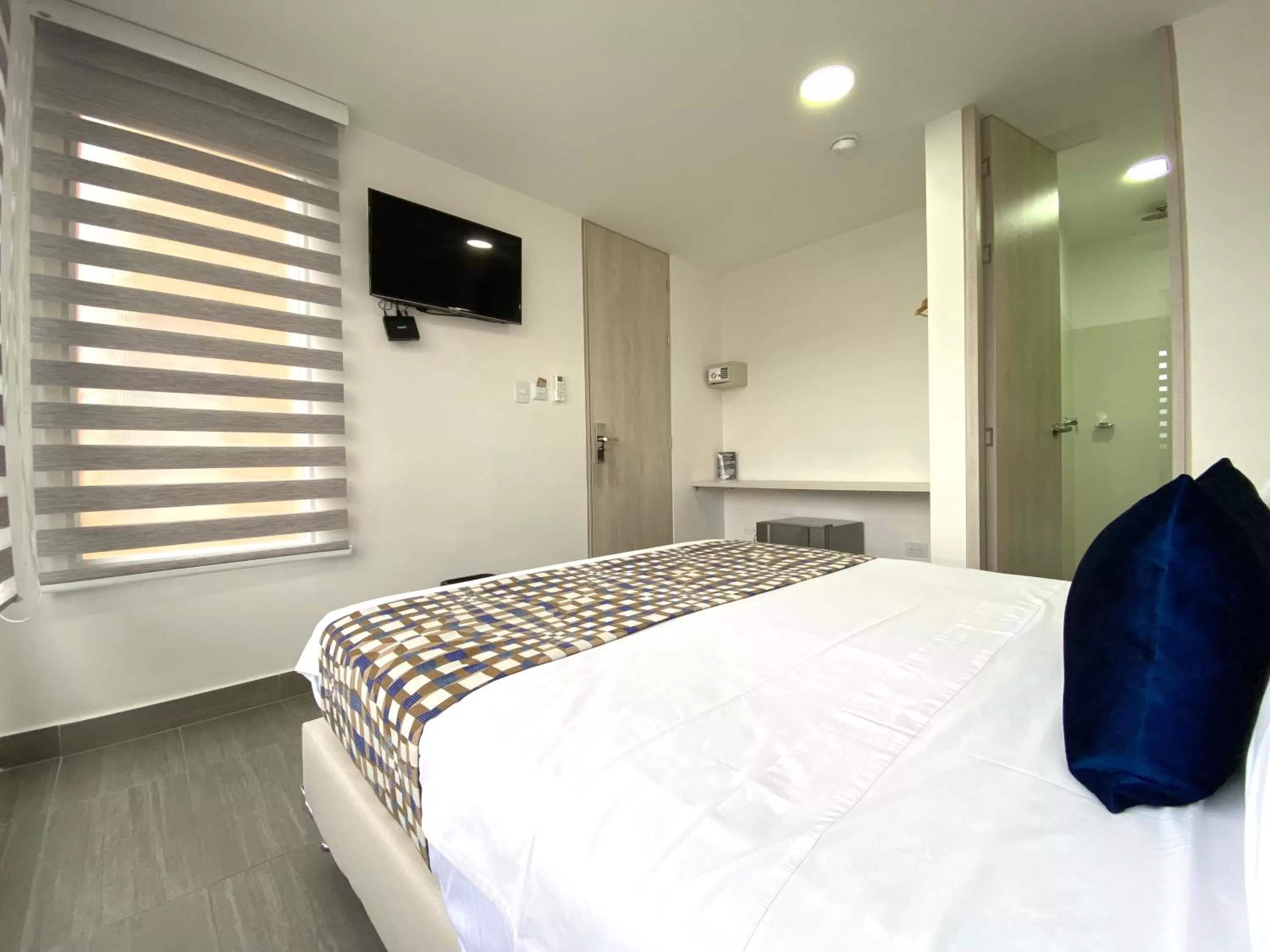 Bed in Seven Inn Hotel