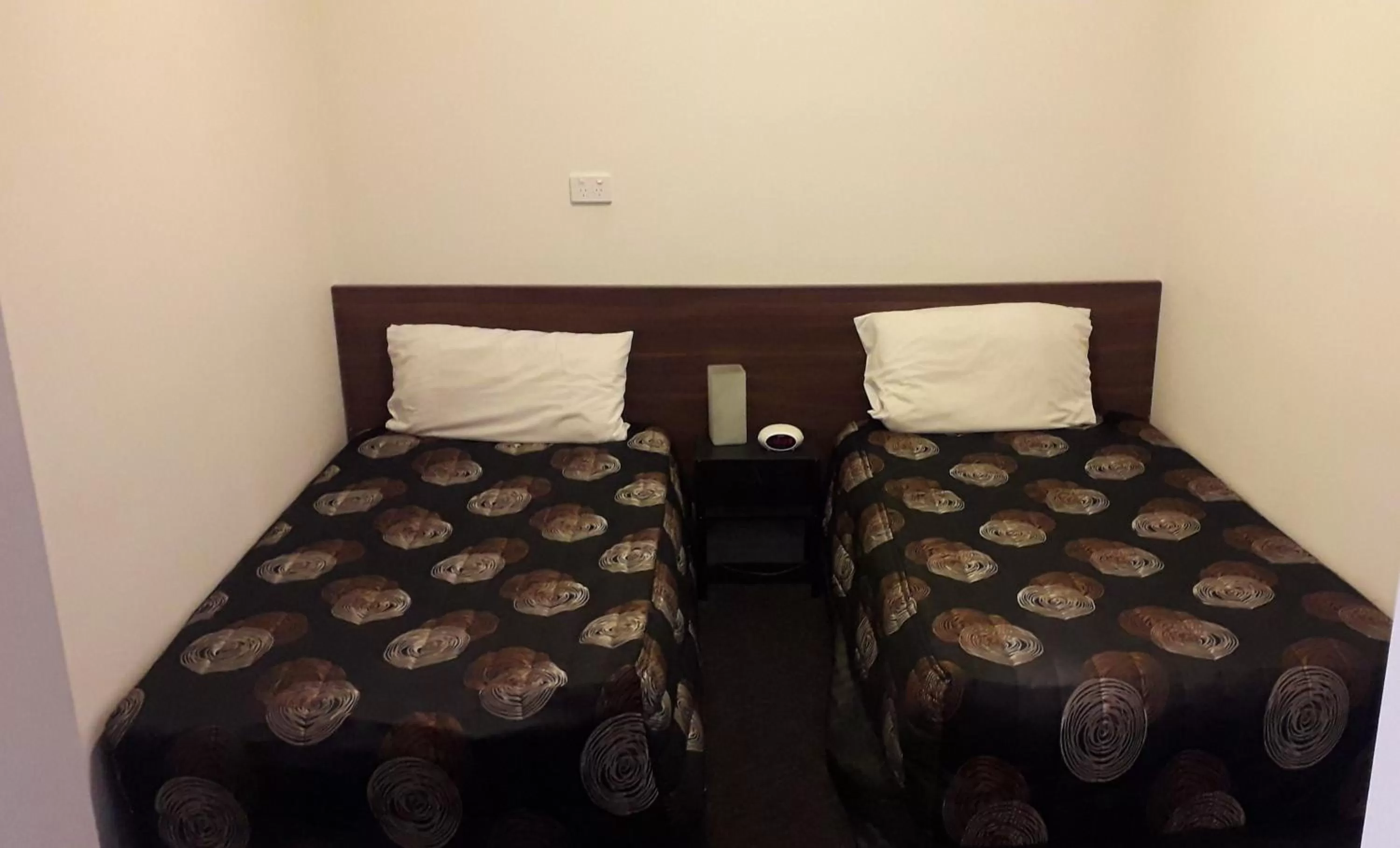 Bed in Daydream Motel and Apartments