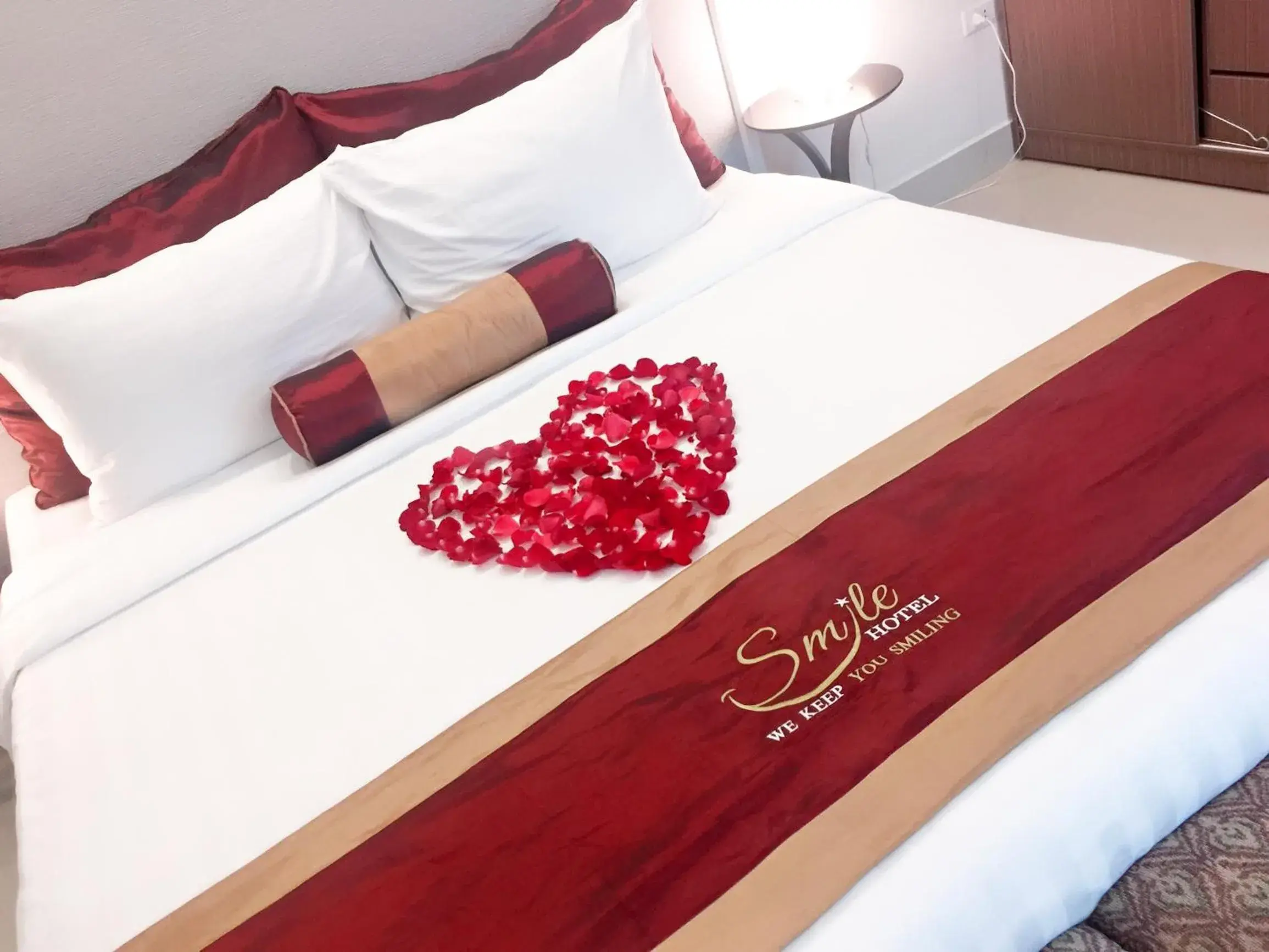 Bed in Smile Hotel