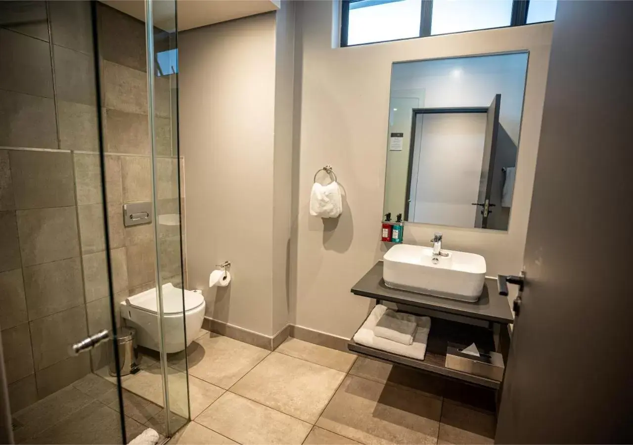 Bathroom in The Catalyst Apartment Hotel by NEWMARK