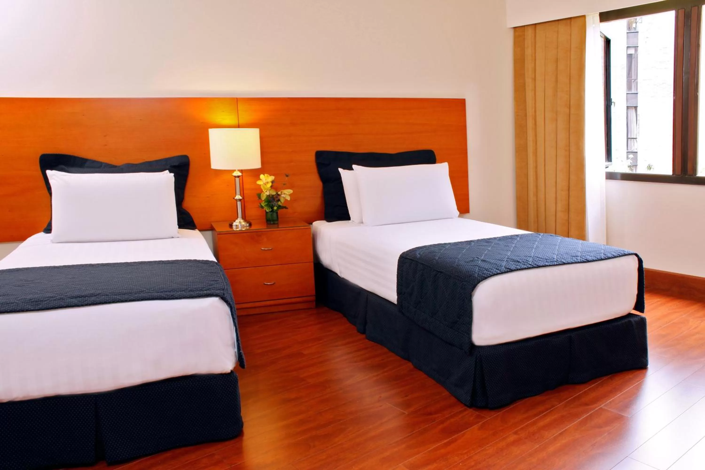 Bedroom, Bed in Estelar Apartamentos Bogotá - La Fontana