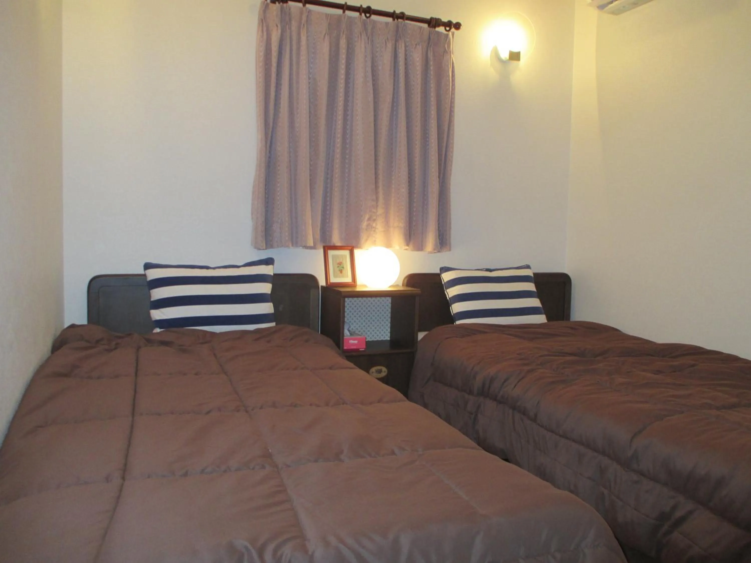 Bed in Jemsty Inn Hakone Ashinoko