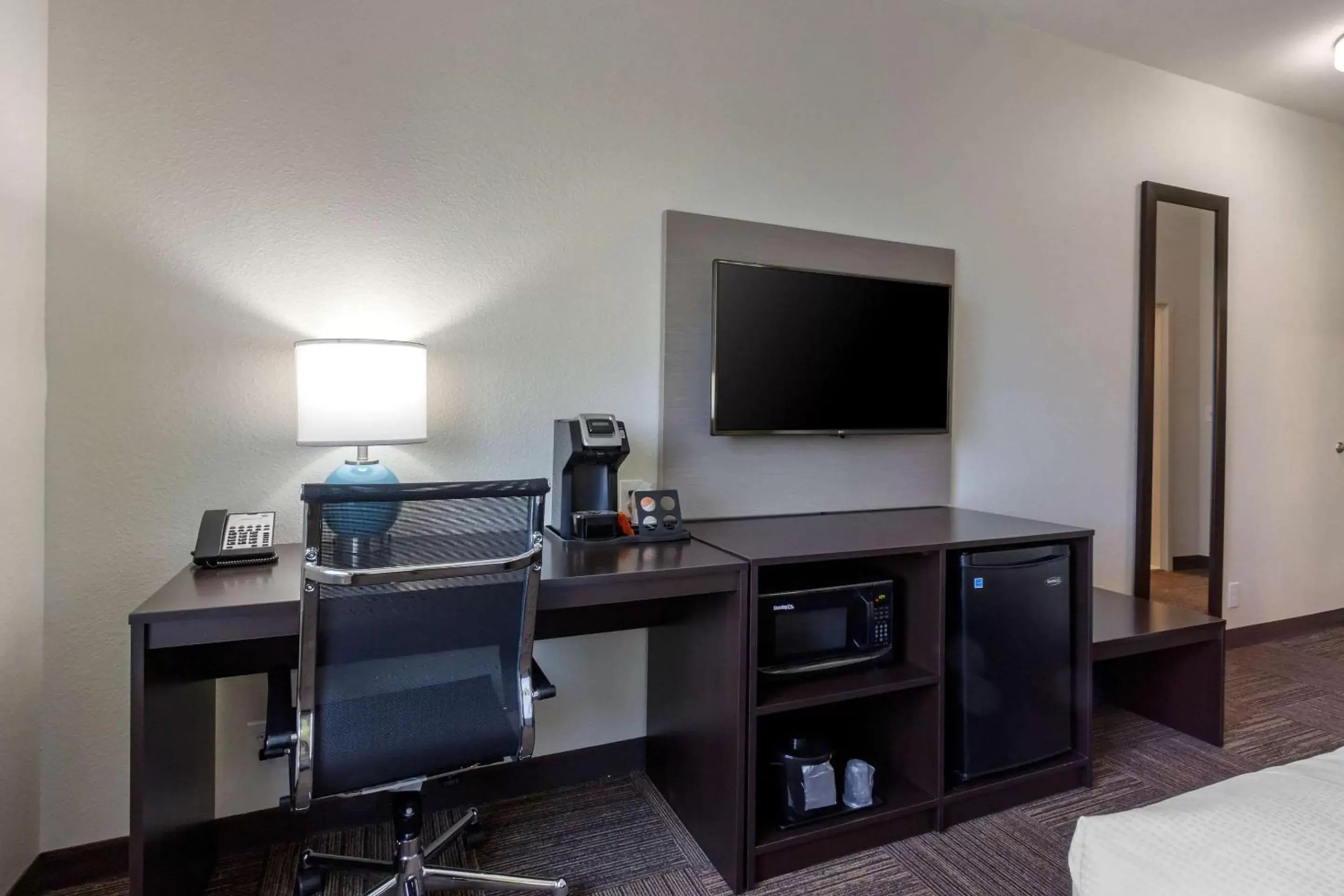 Photo of the whole room, TV/Entertainment Center in Sleep Inn & Suites Tampa South