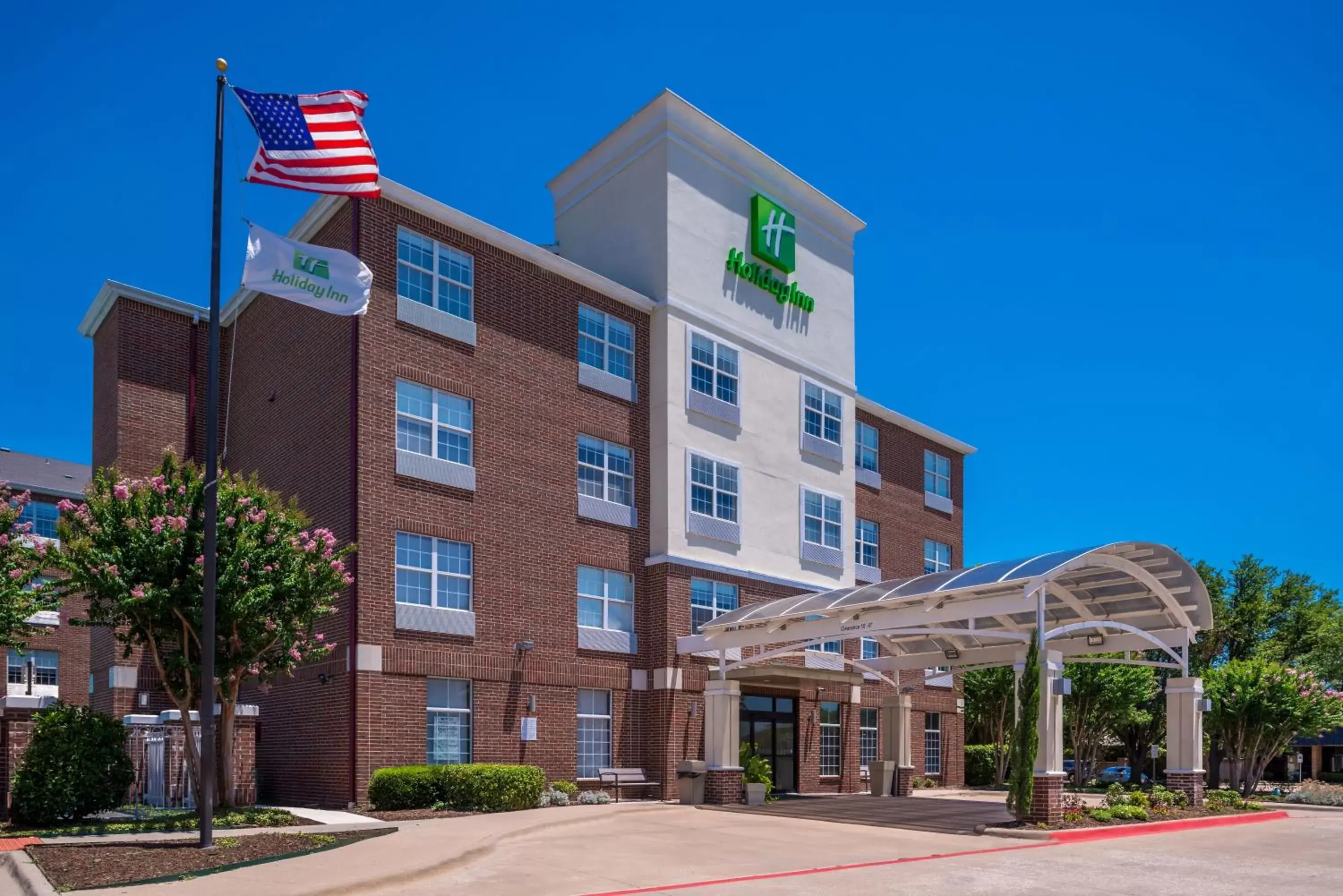 Property Building in Holiday Inn and Suites Addison, an IHG Hotel