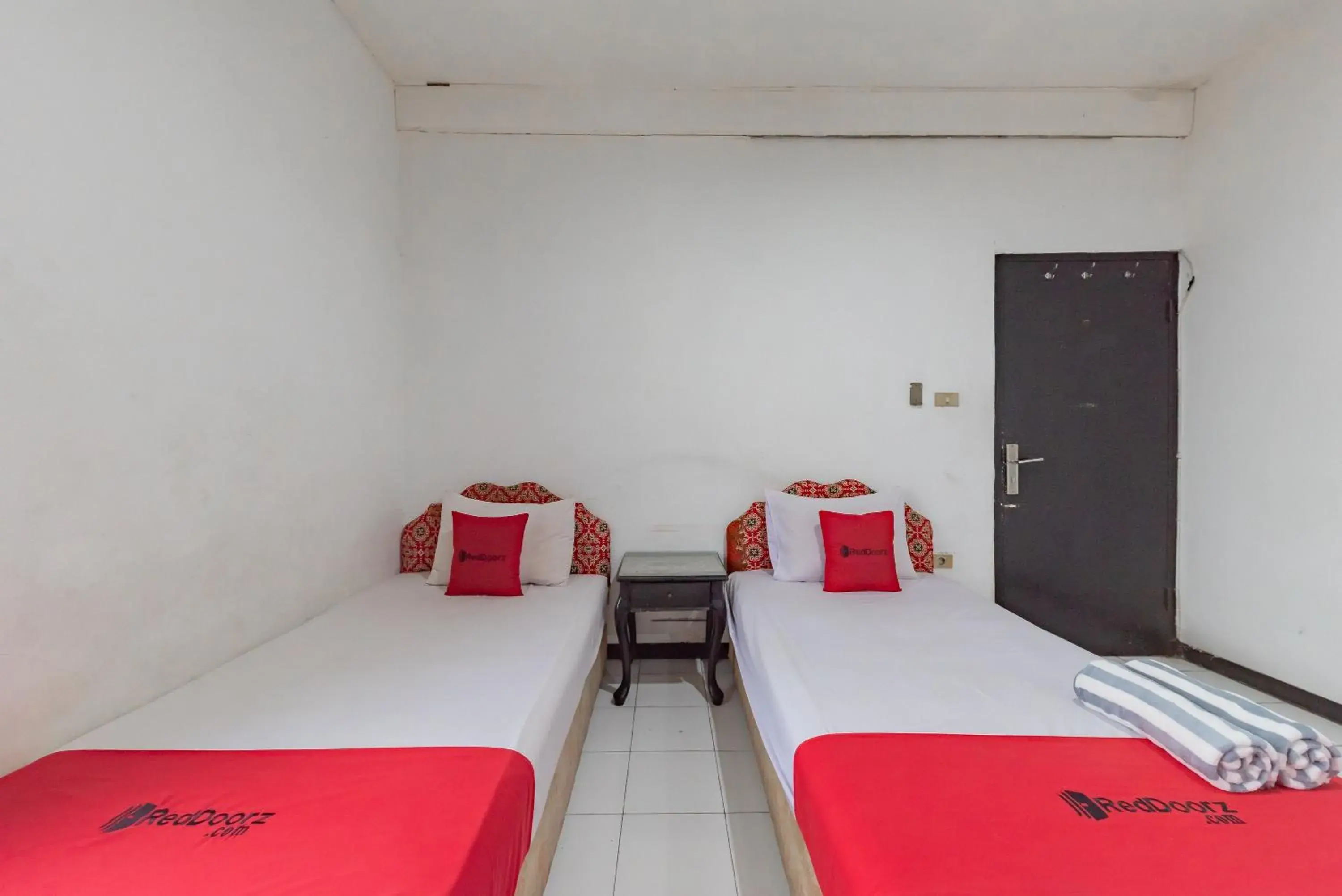 Bed in RedDoorz near Alun-Alun Kota Sukabumi