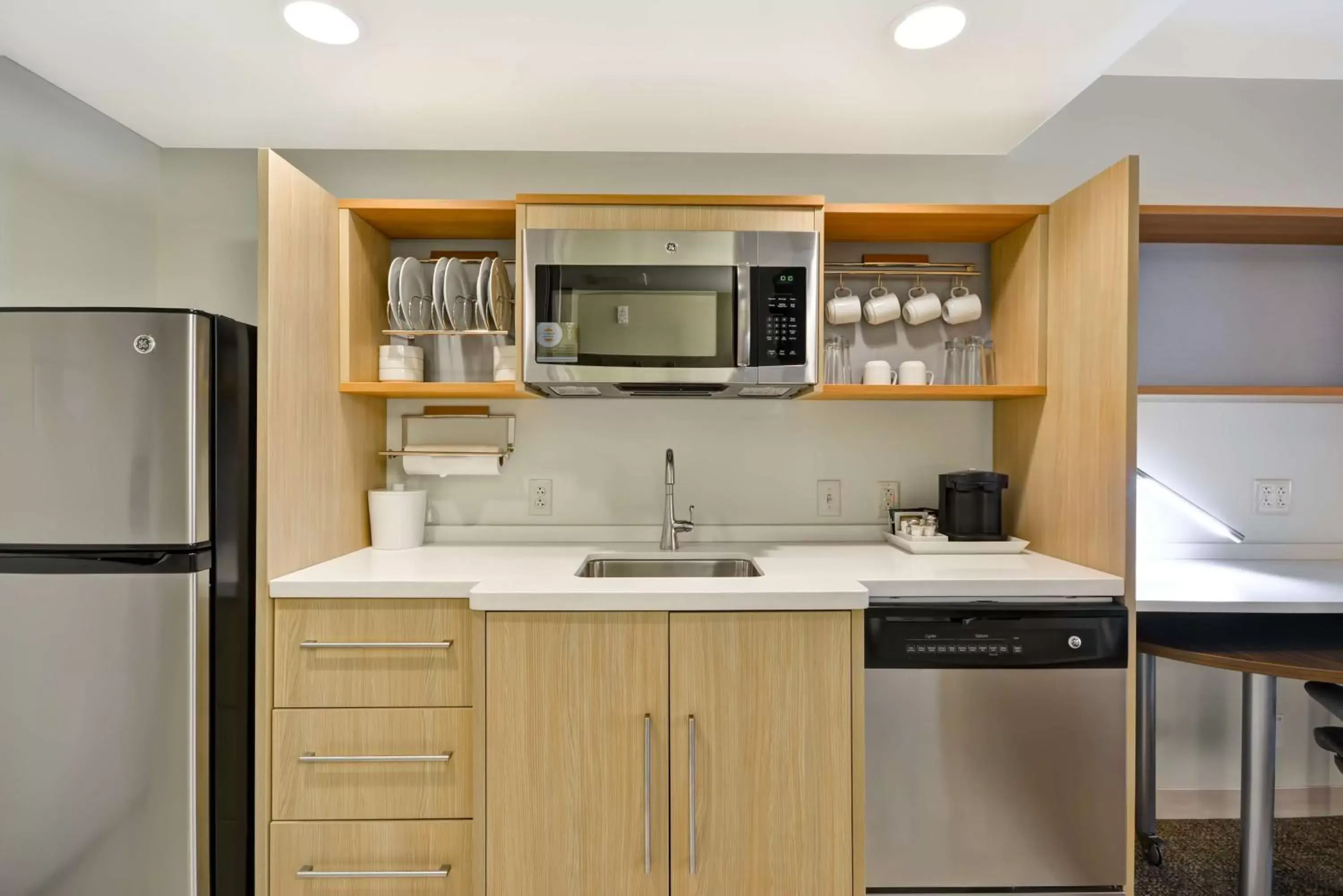 Bedroom, Kitchen/Kitchenette in Home2 Suites By Hilton Decatur Ingalls Harbor