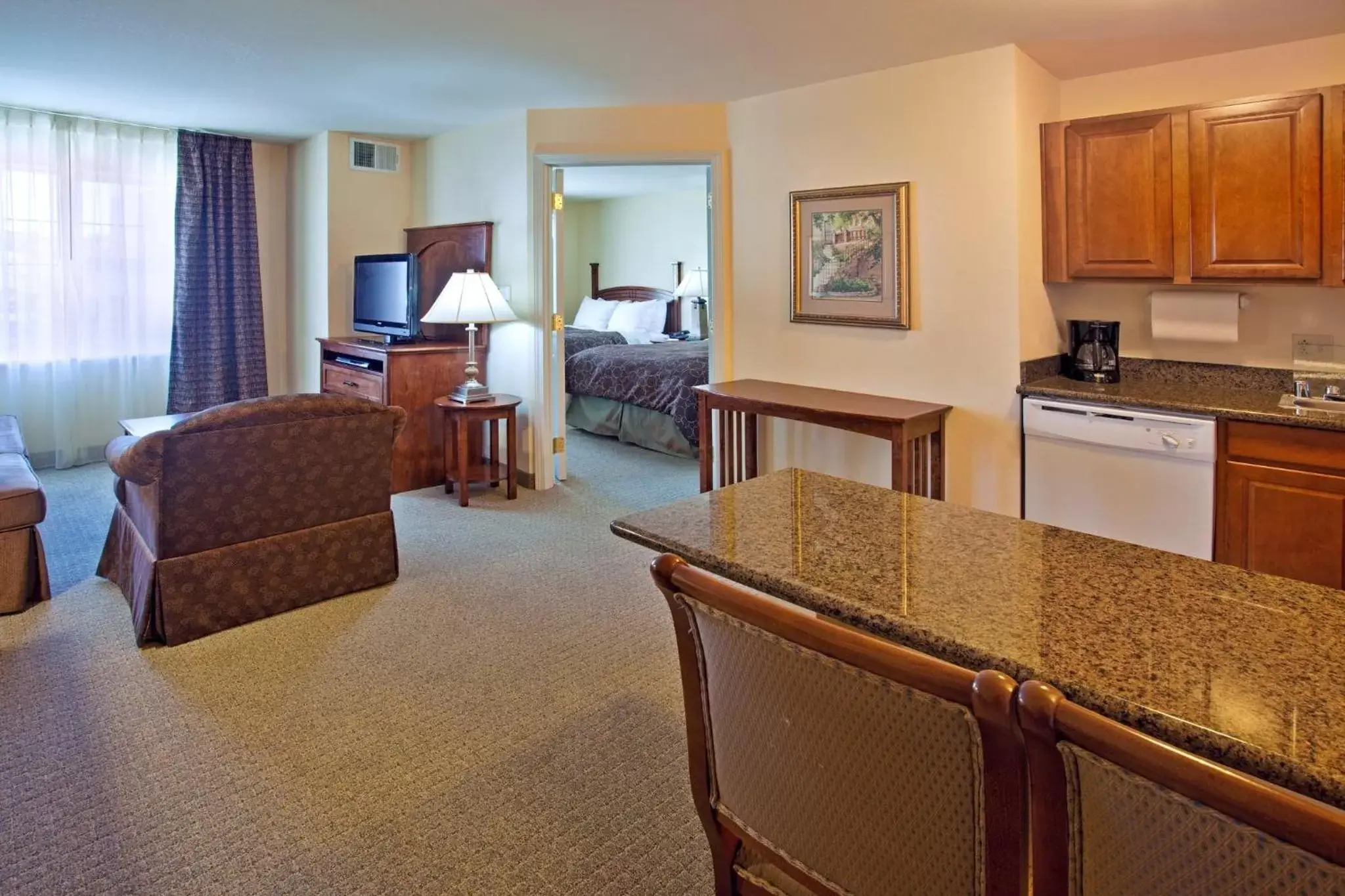 Photo of the whole room, Kitchen/Kitchenette in Staybridge Suites - Albuquerque Airport, an IHG Hotel