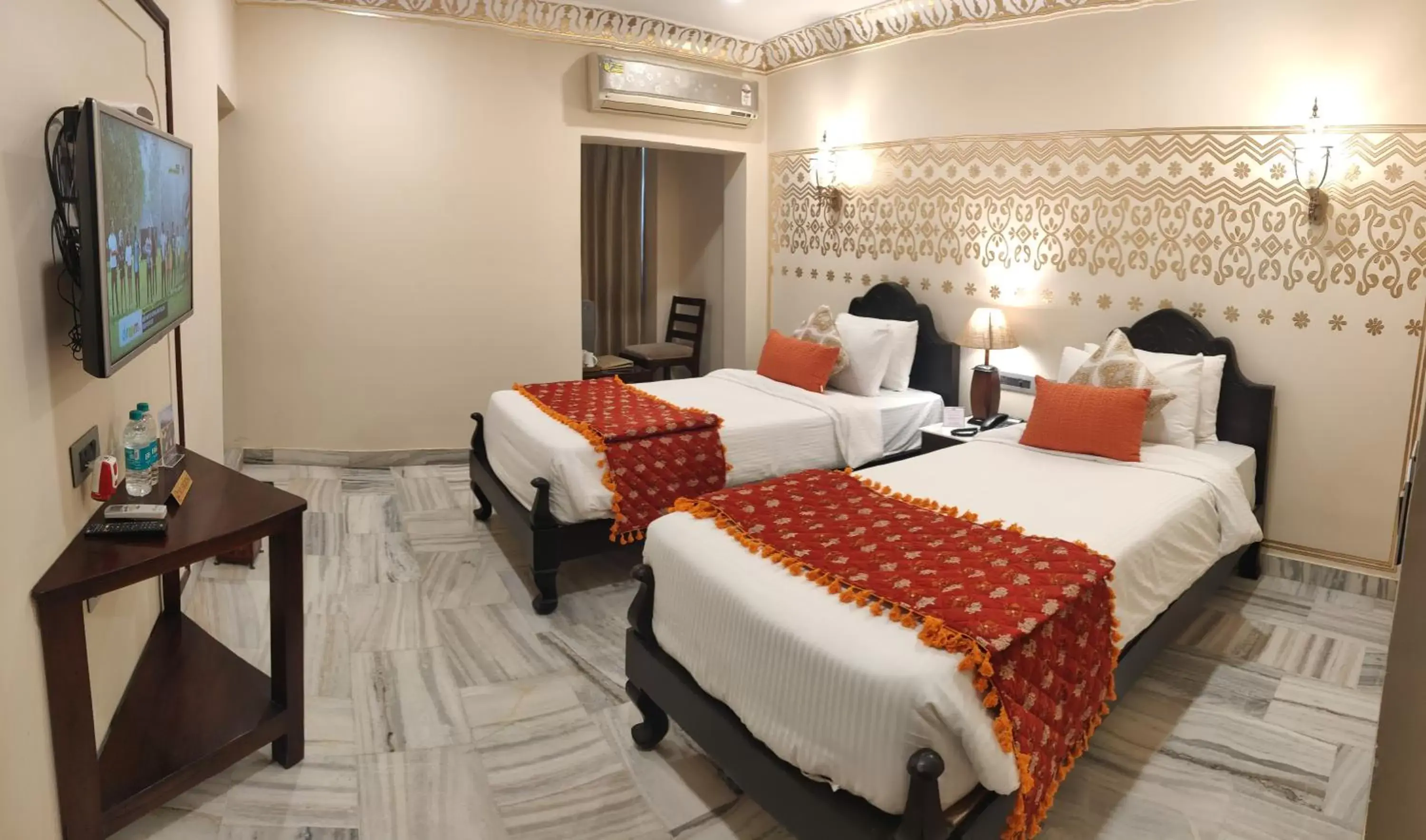 Bed in Laxmi Palace Heritage Boutique Hotel