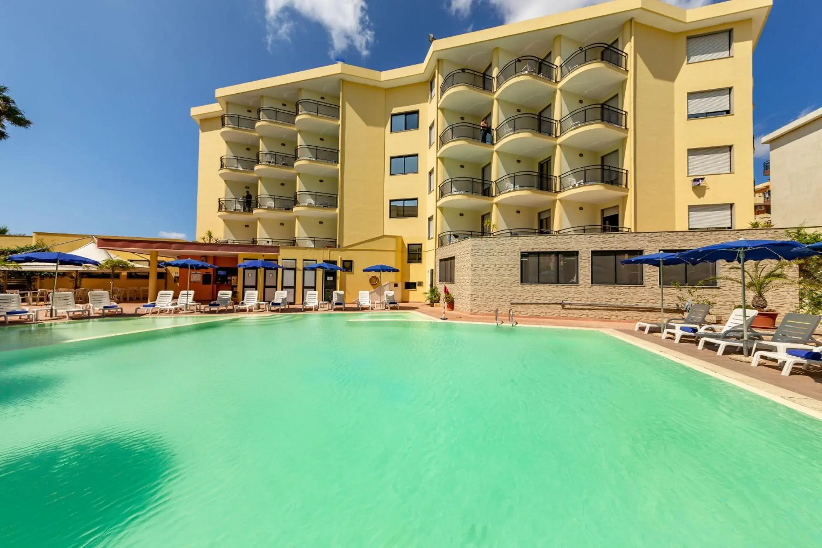 Swimming pool, Property Building in Rina Hotel