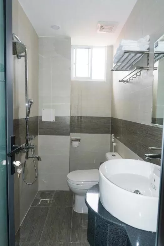 Bathroom in Aries Hotel