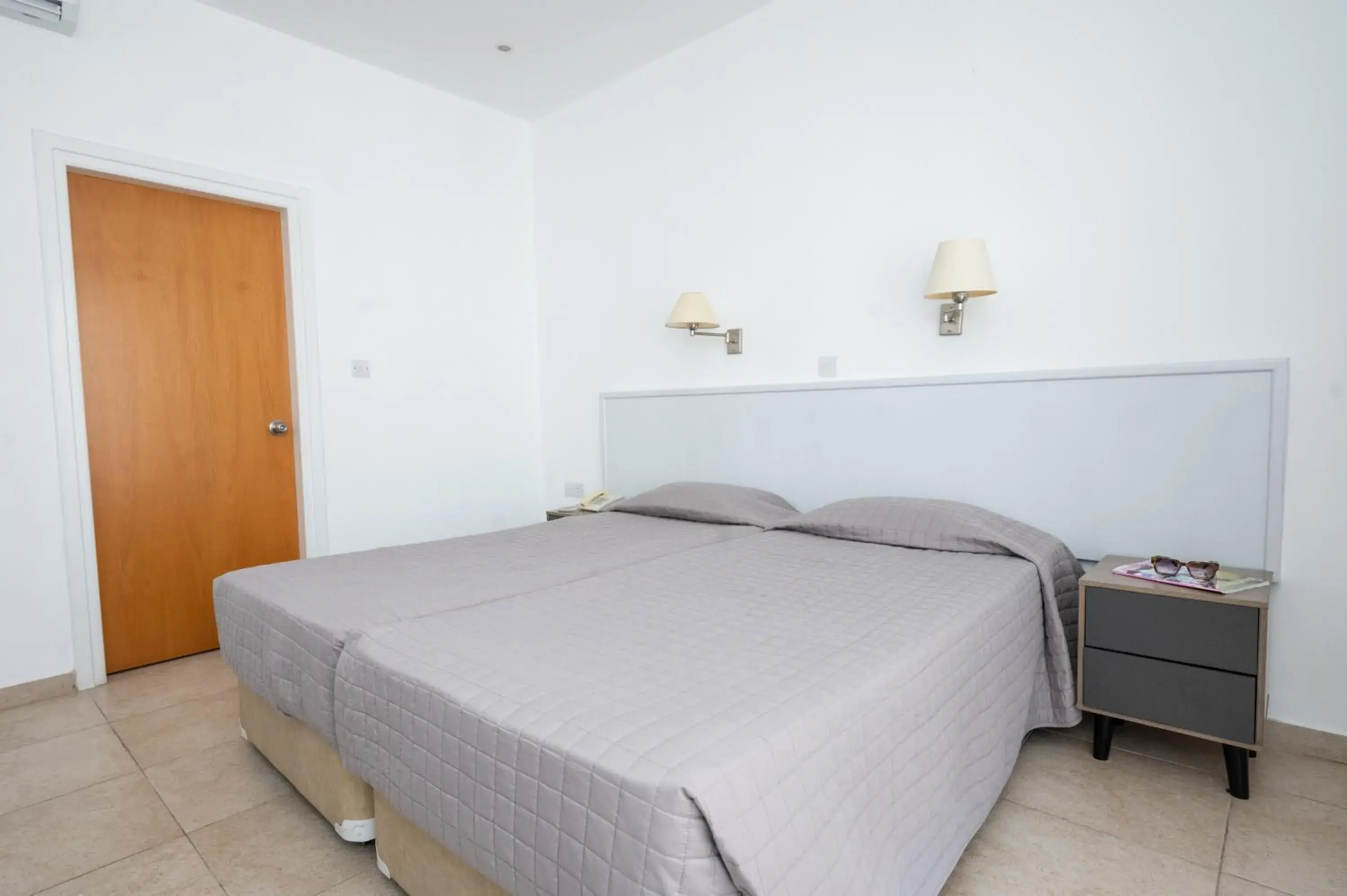 Bed in New Famagusta Hotel & Suites