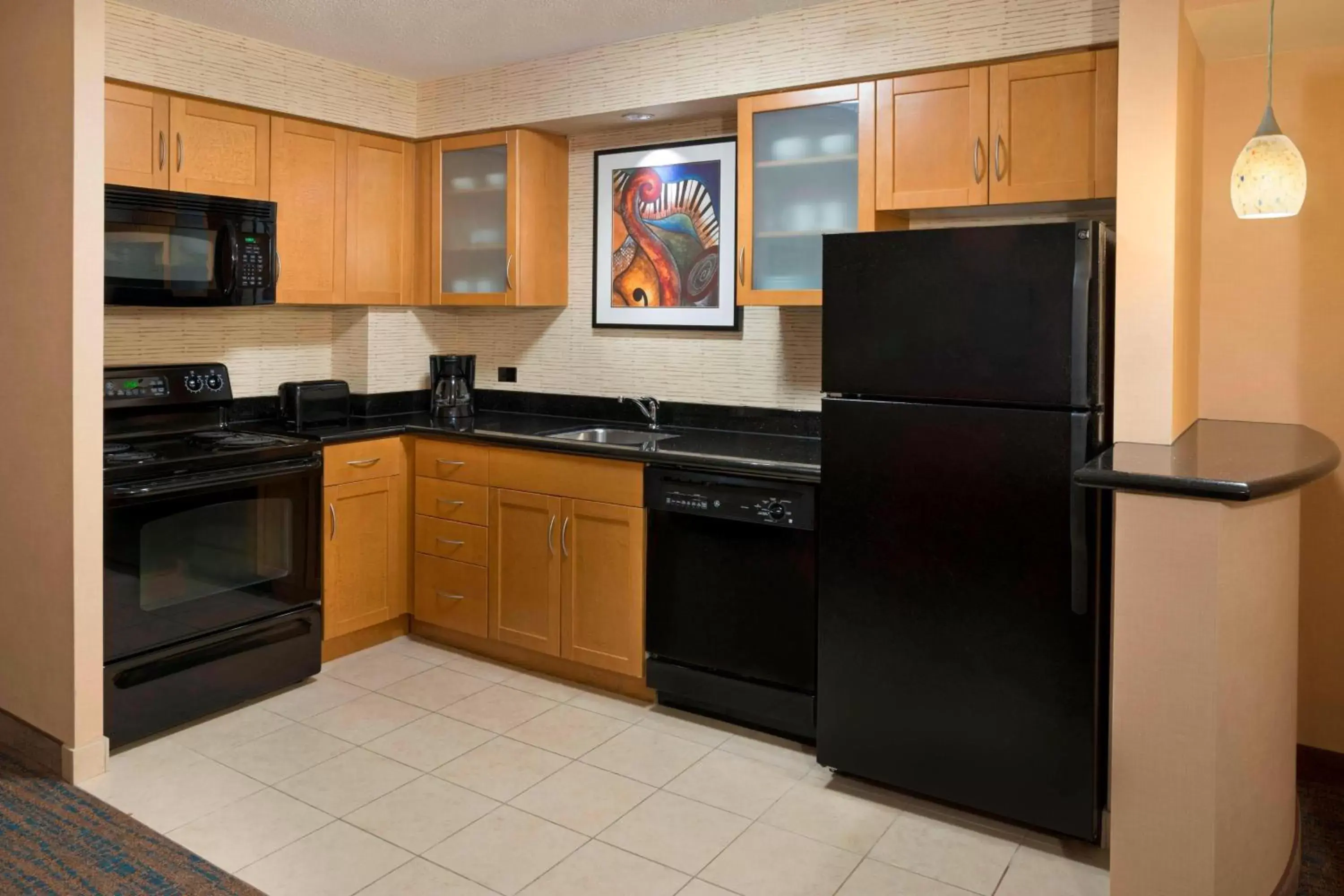 Bedroom, Kitchen/Kitchenette in Residence Inn by Marriott Toronto Downtown / Entertainment District