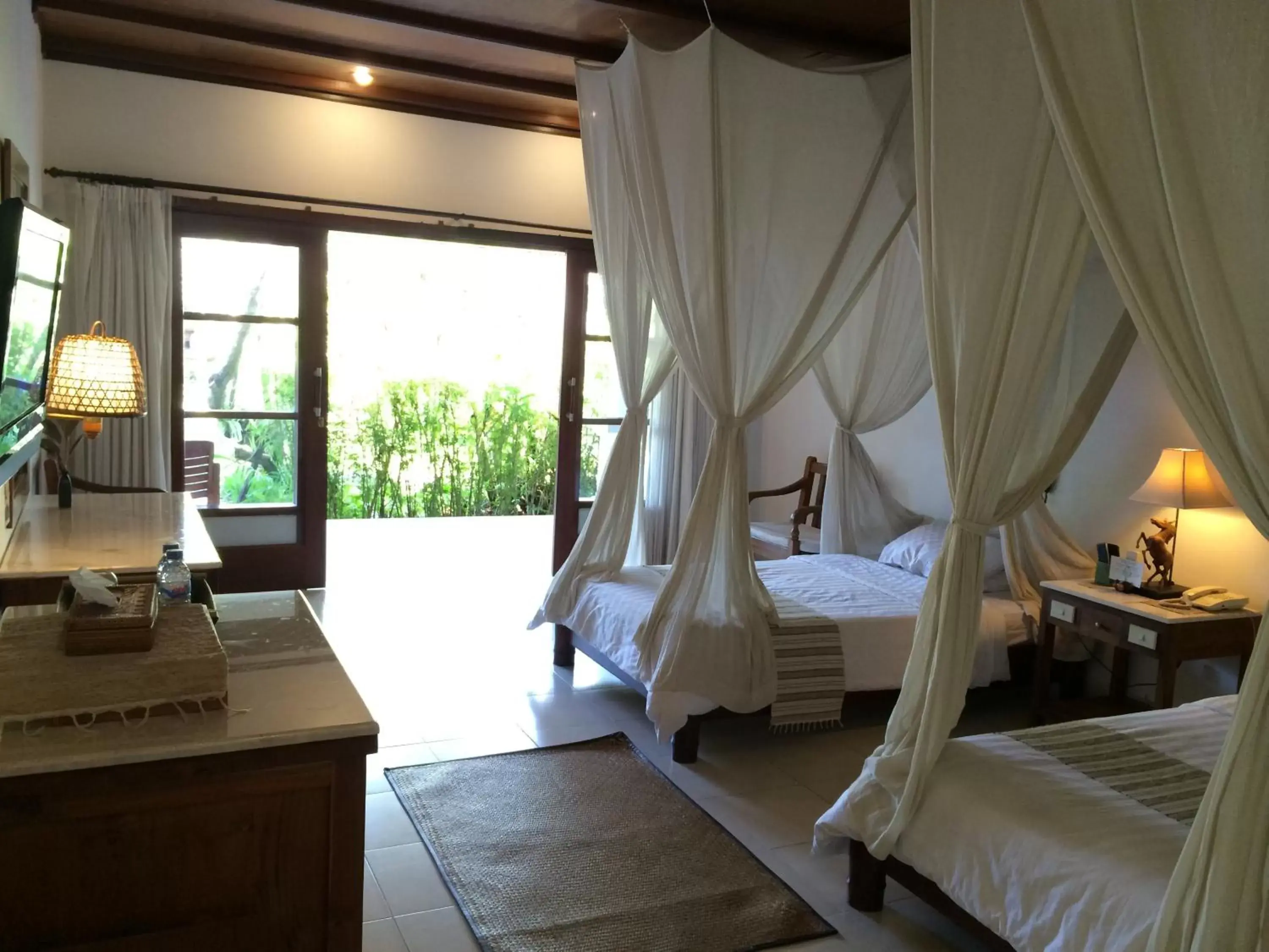 Photo of the whole room, Bed in Bumi Ayu Bungalow Sanur