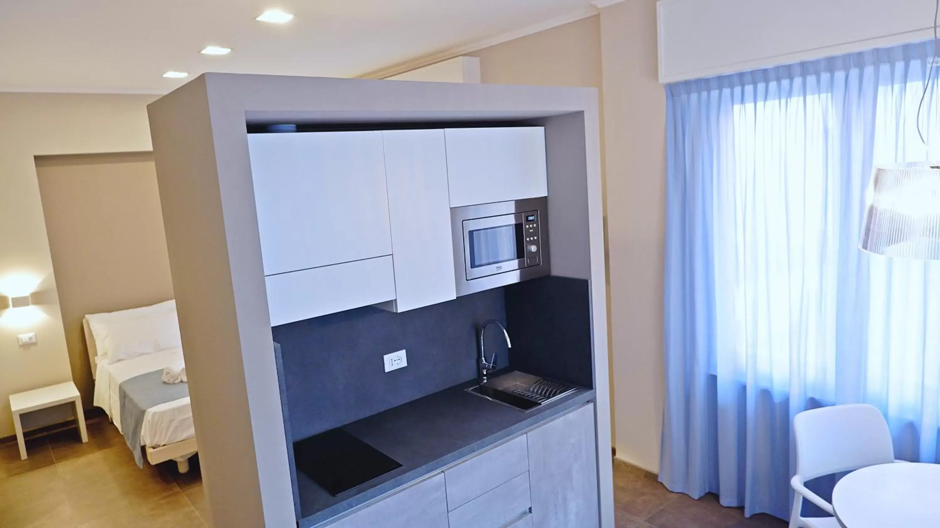 Kitchen/Kitchenette in Pianomare Riviera Apartments and Rooms