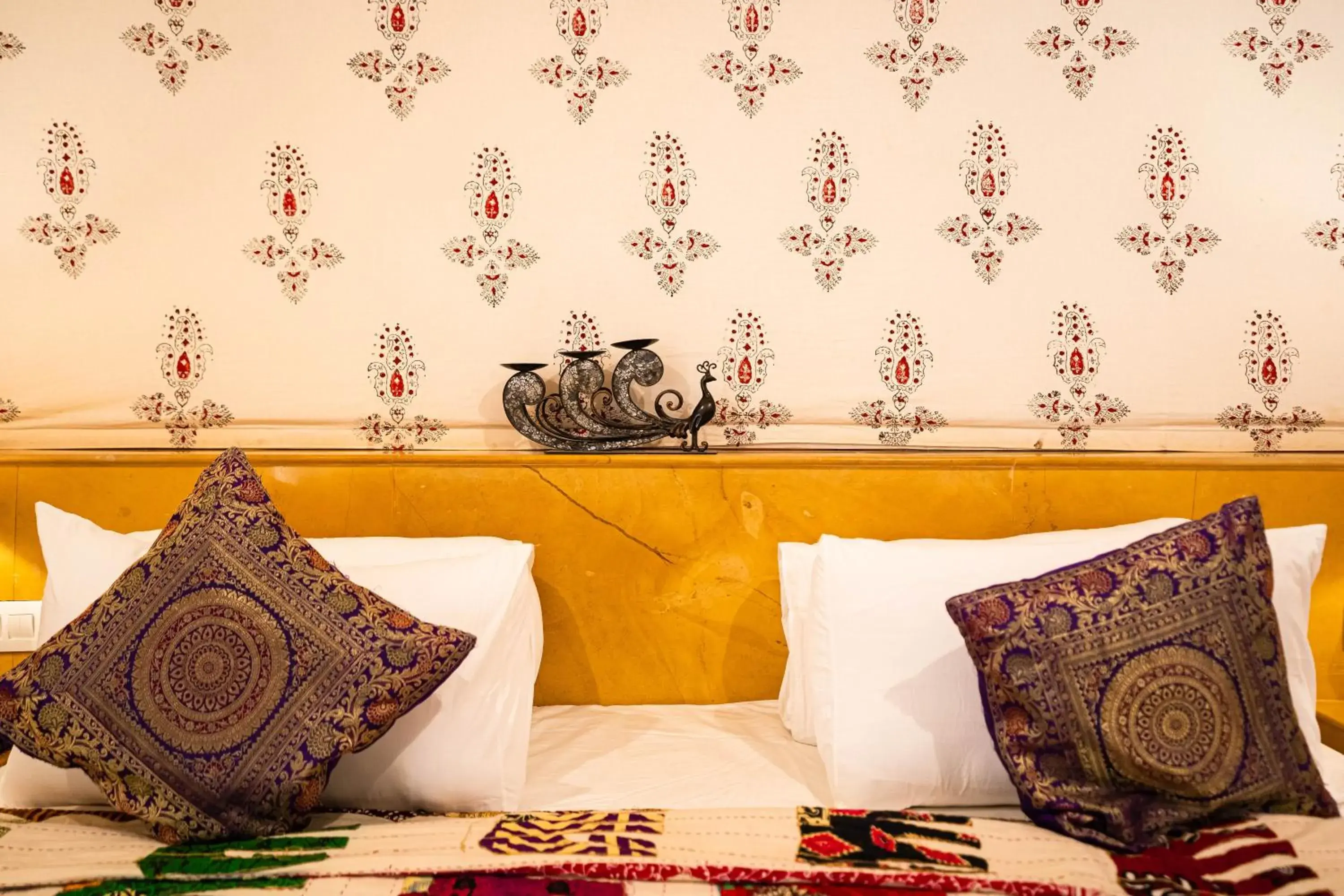 Bed in Chokhi Dhani - The Palace Hotel