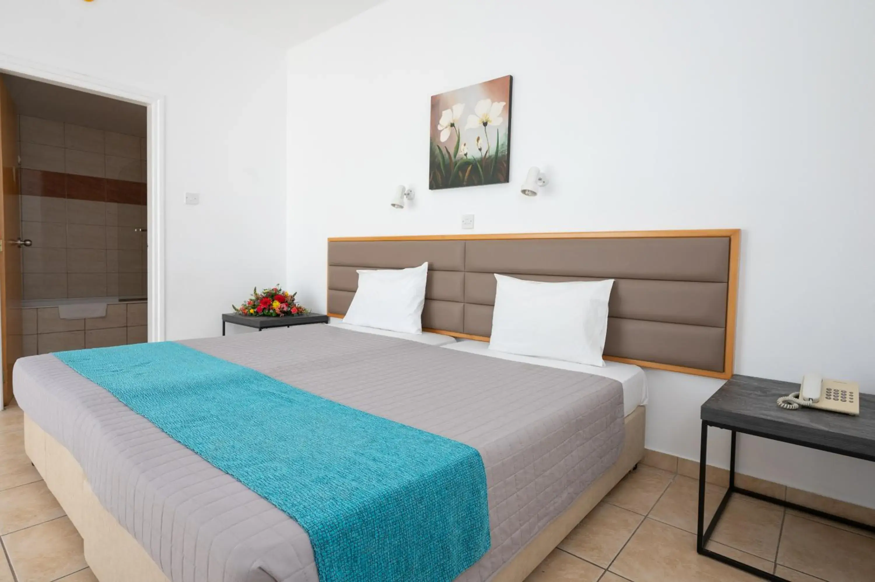 Bed in New Famagusta Hotel & Suites