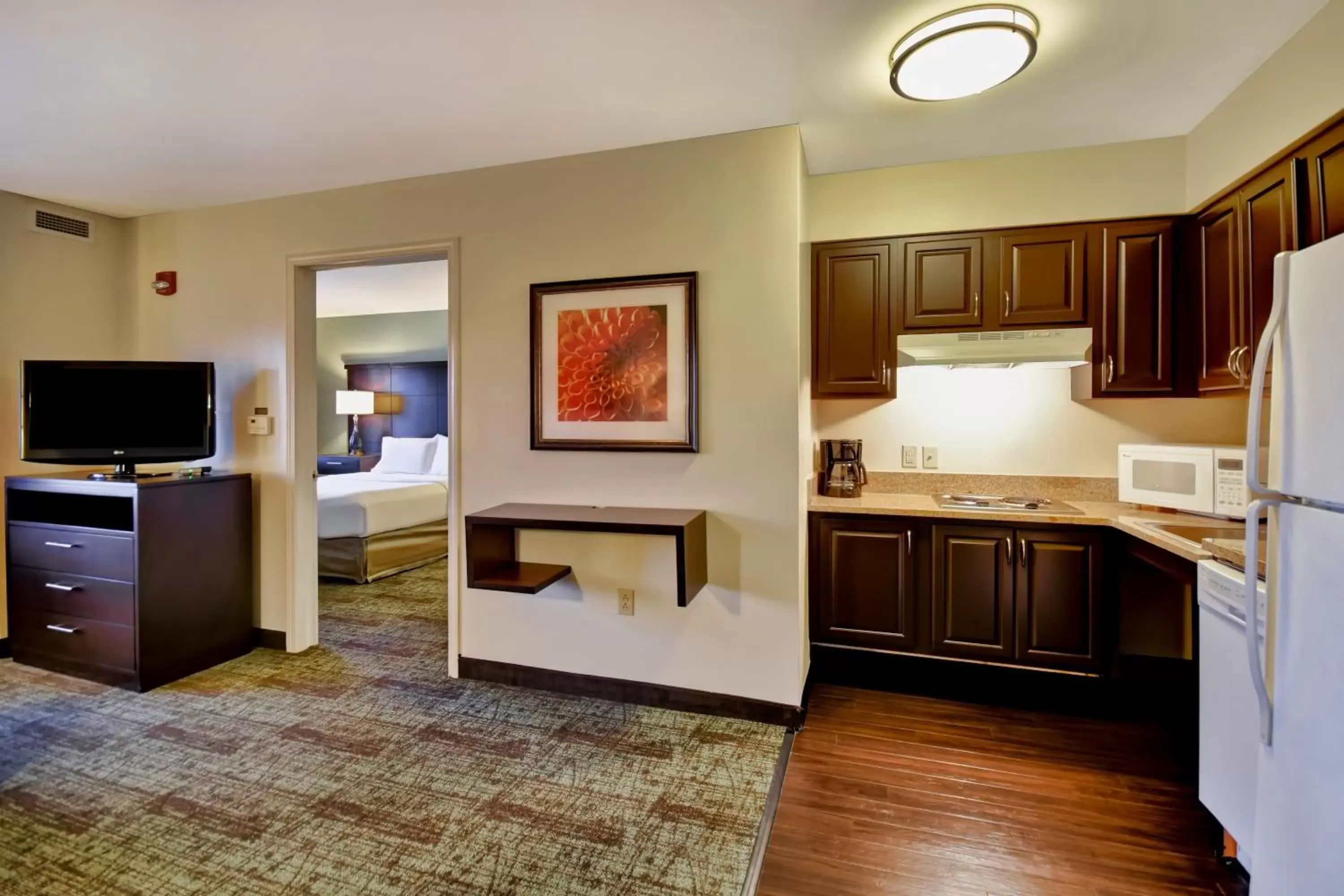 Photo of the whole room, Kitchen/Kitchenette in Staybridge Suites Madison - East, an IHG Hotel