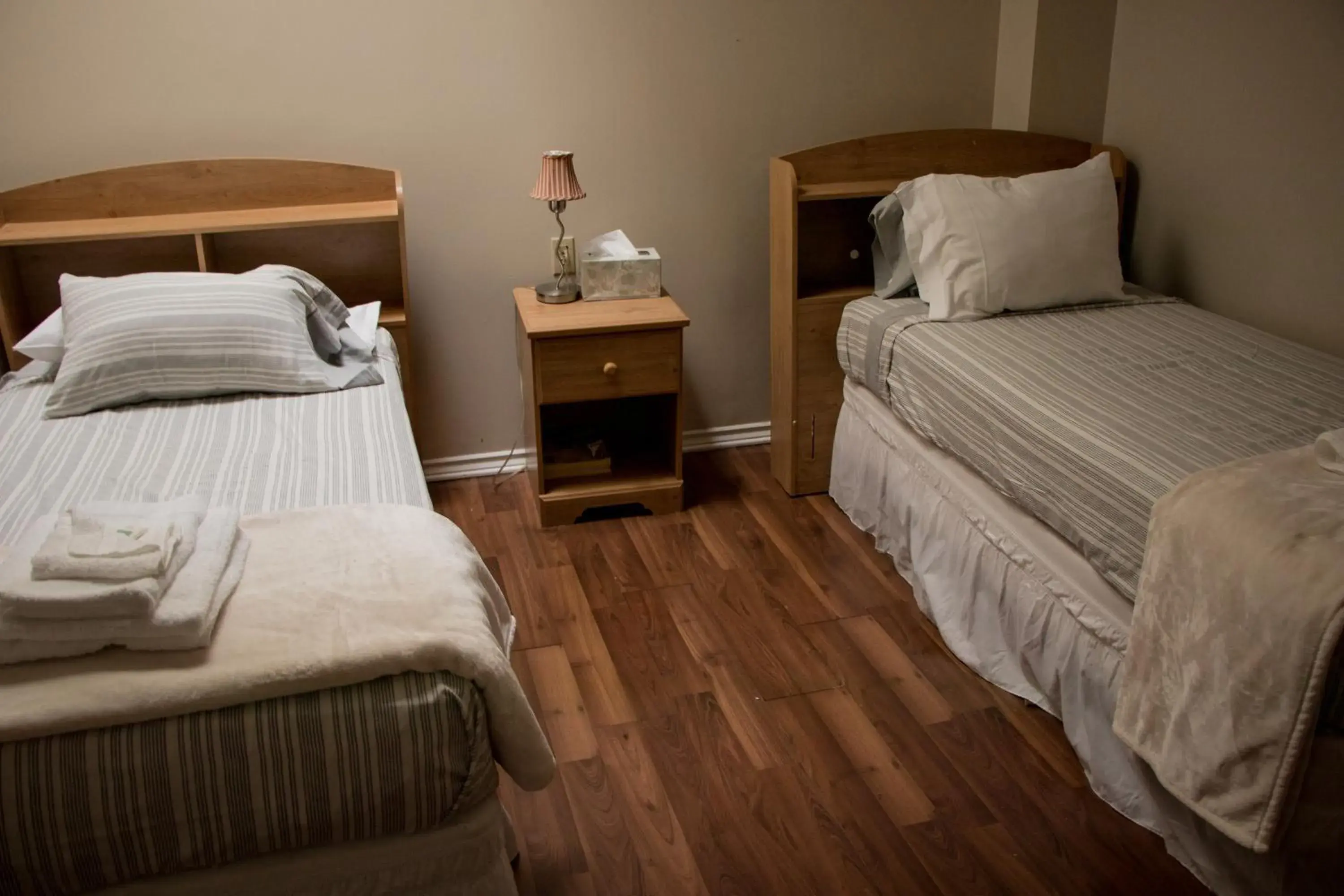 Bed in Saint Lawrence Residences and Suites