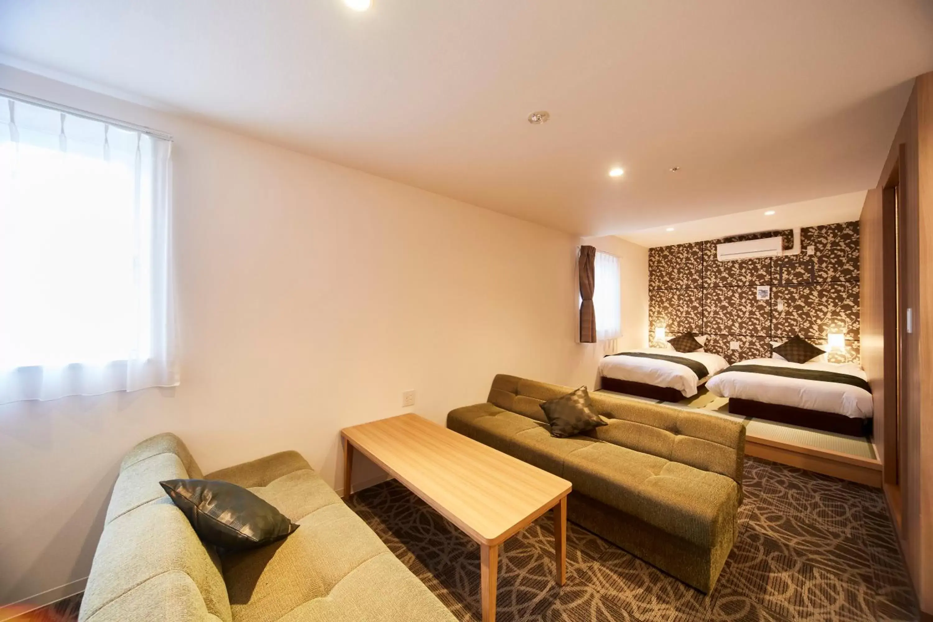 Bedroom, Seating Area in Sakura Garden Hotel