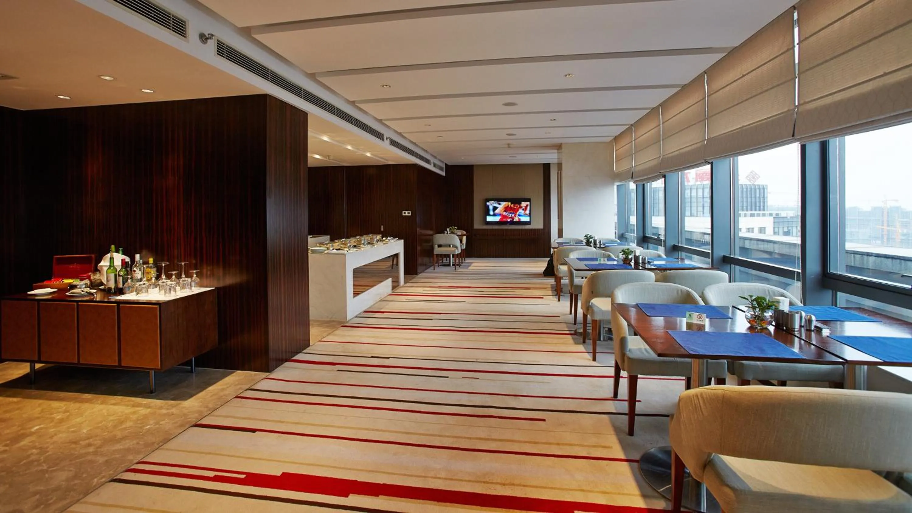 Lounge or bar in Holiday Inn Taicang City Centre by IHG
