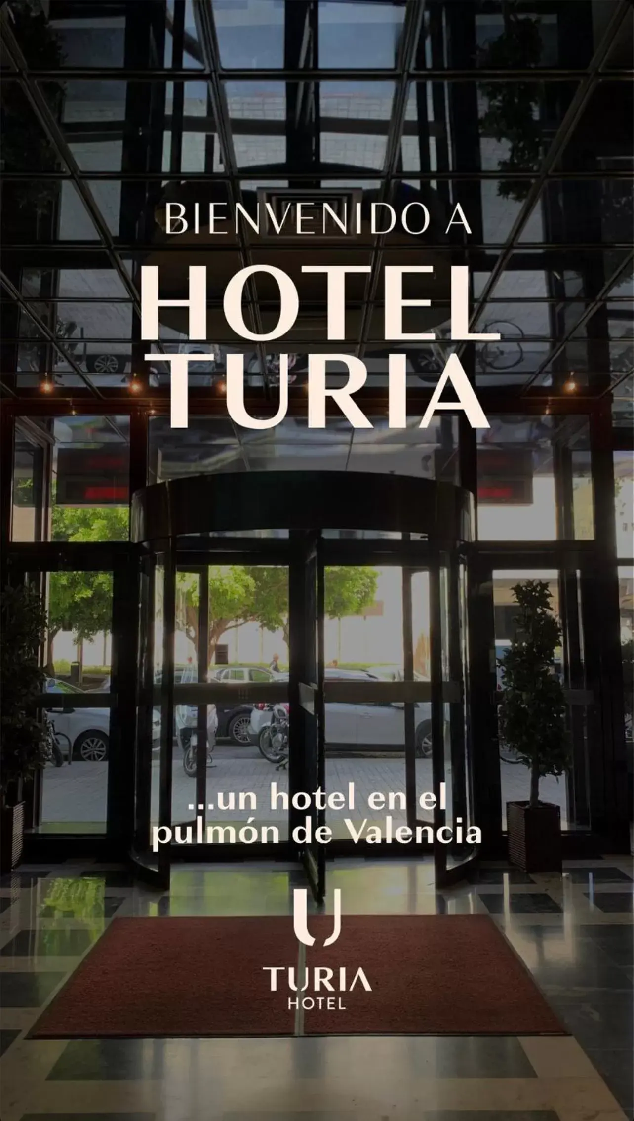 Property logo or sign in Hotel Turia