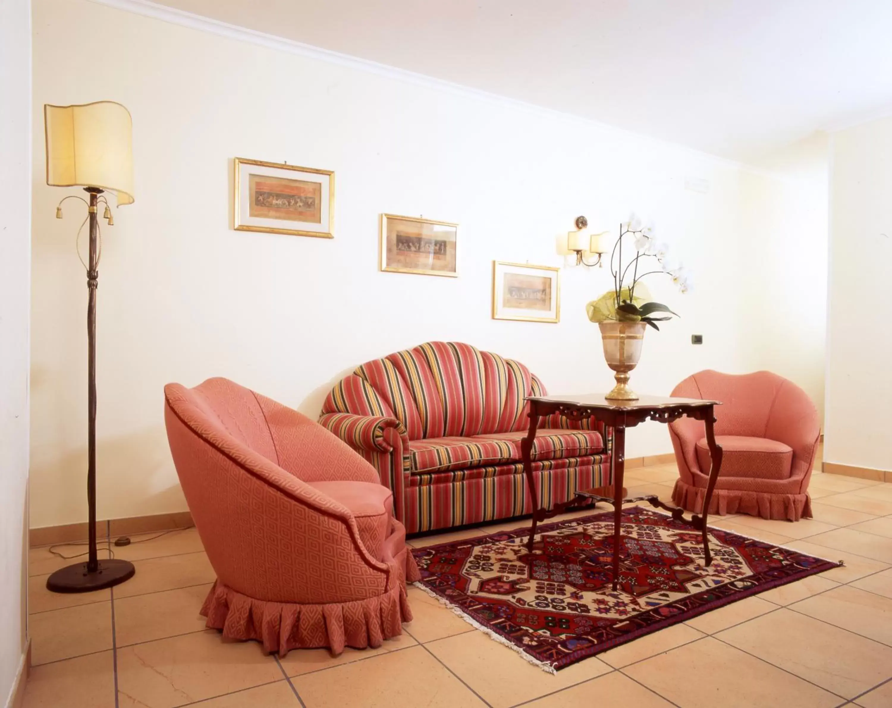 Bed, Seating Area in Santa Caterina