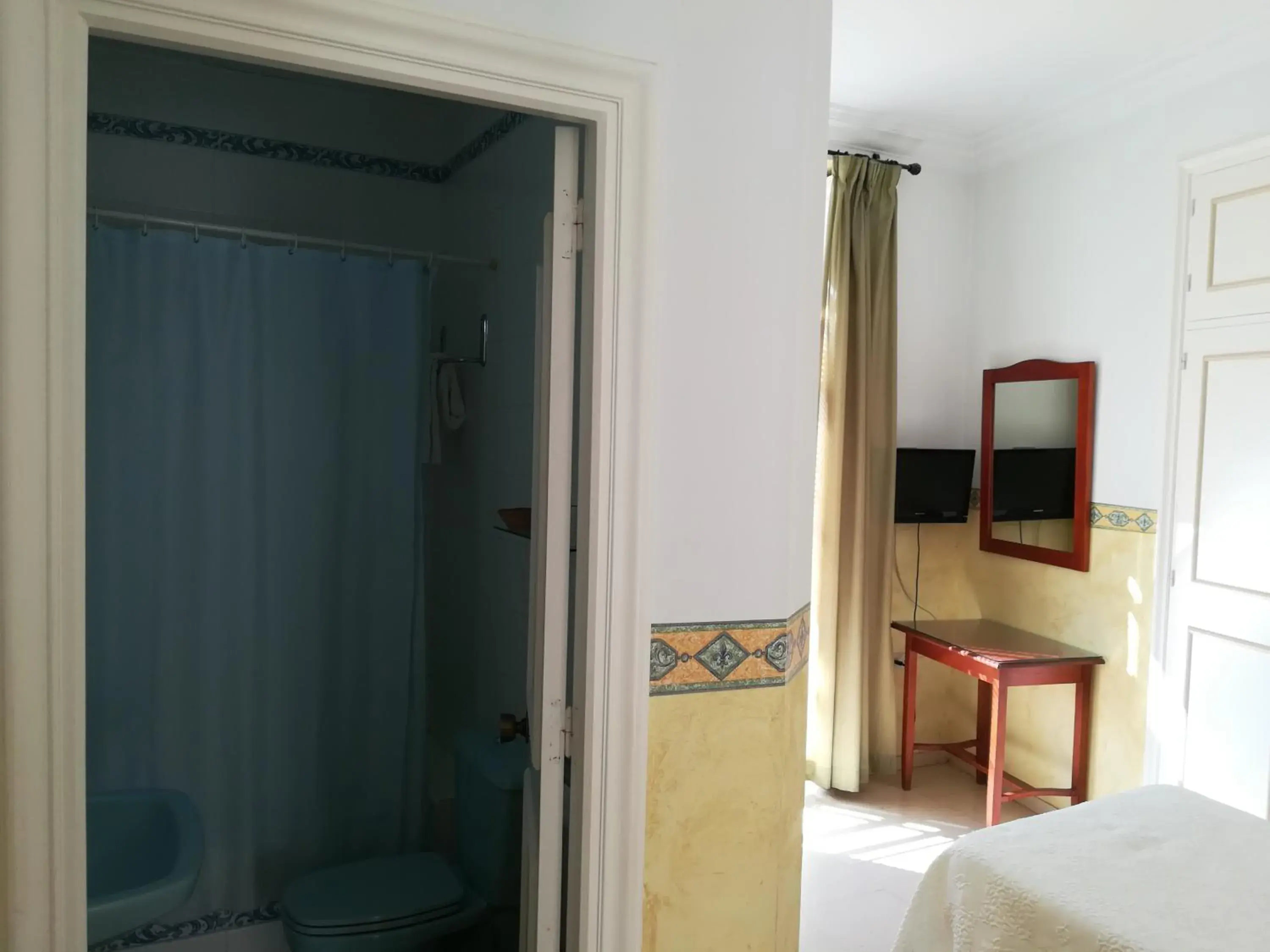 Photo of the whole room, Bathroom in Nuevo Hotel