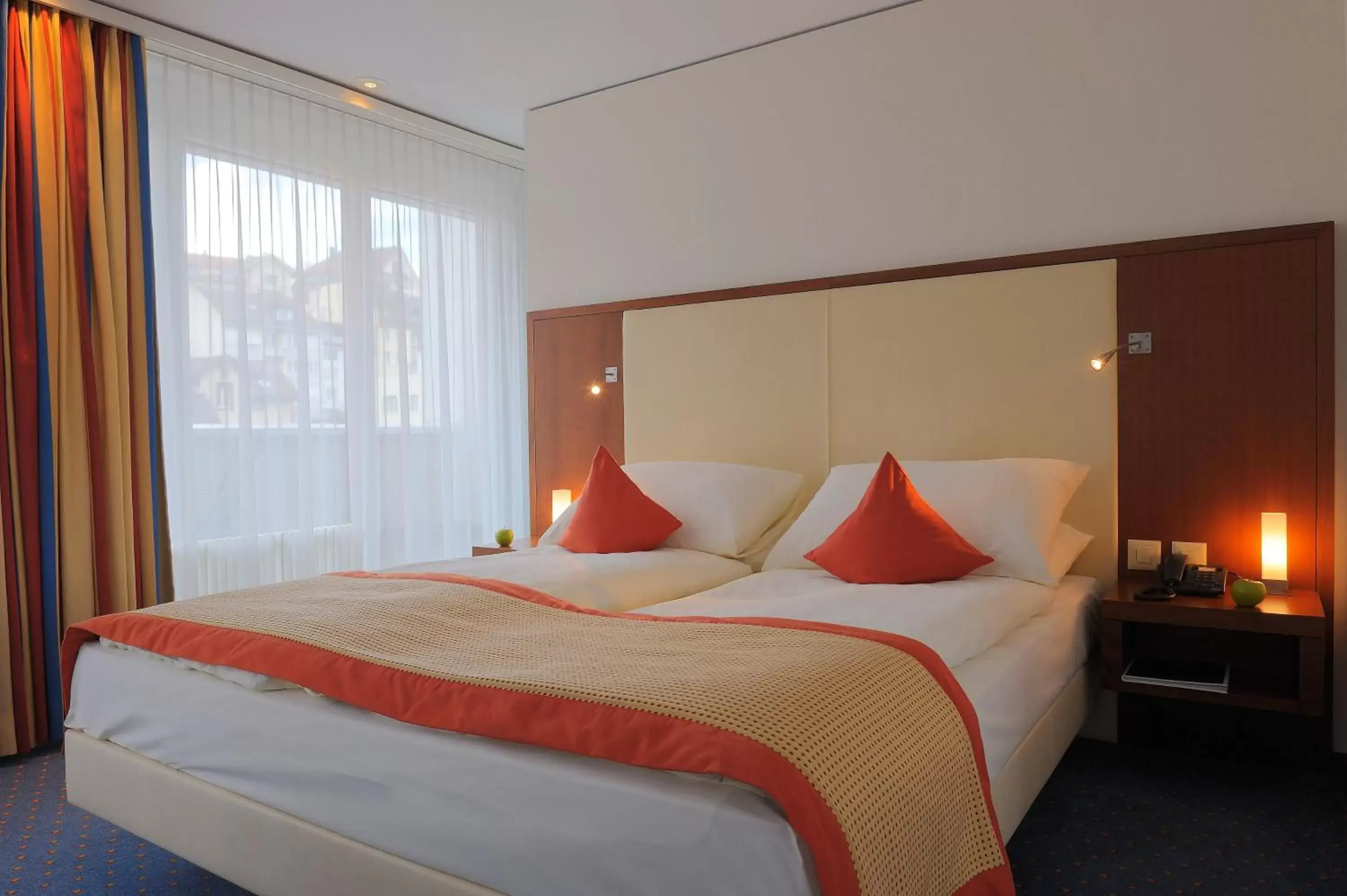 Bed in Radisson Blu Hotel, St. Gallen