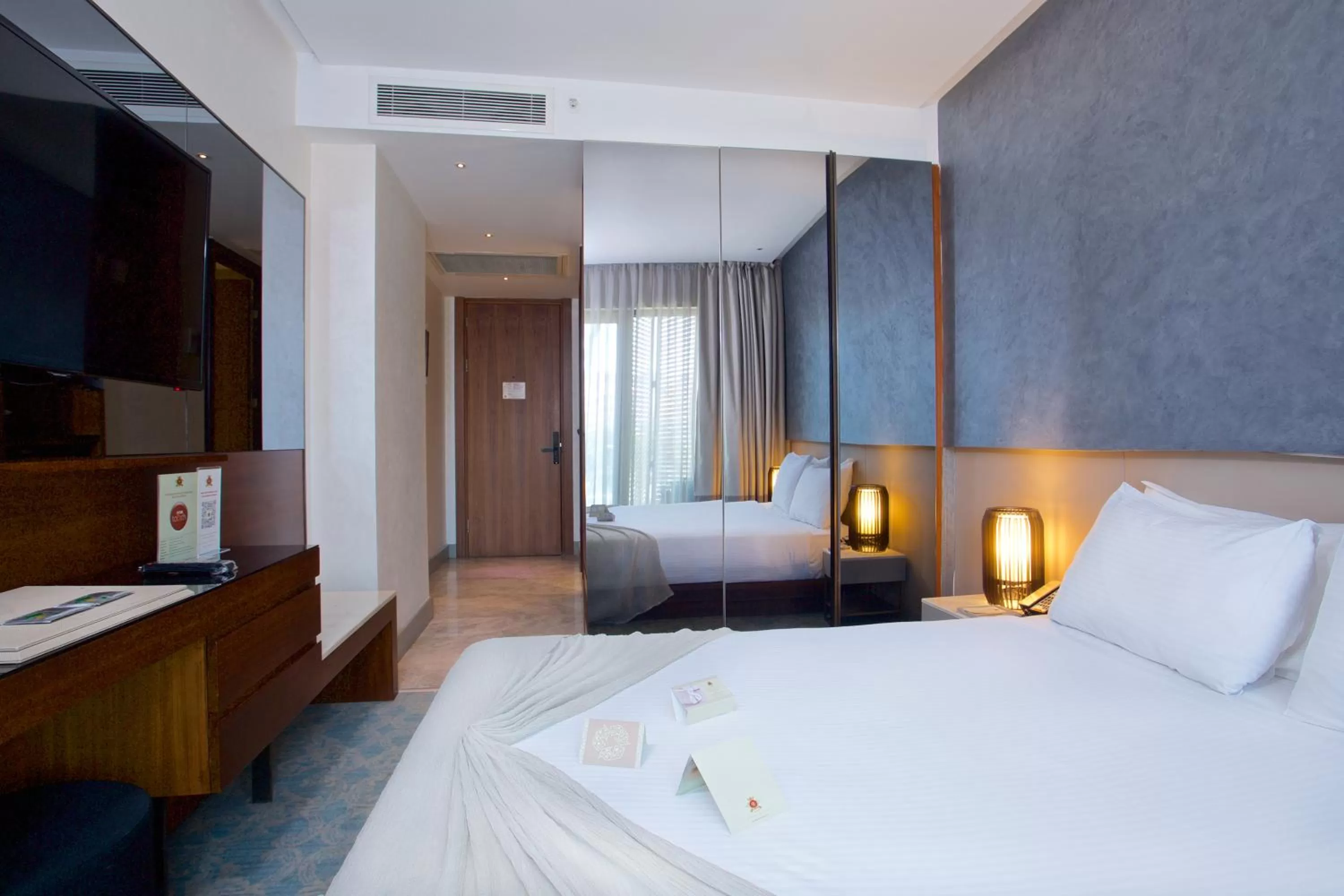 Bed in Dosso Dossi Hotels & SPA Downtown