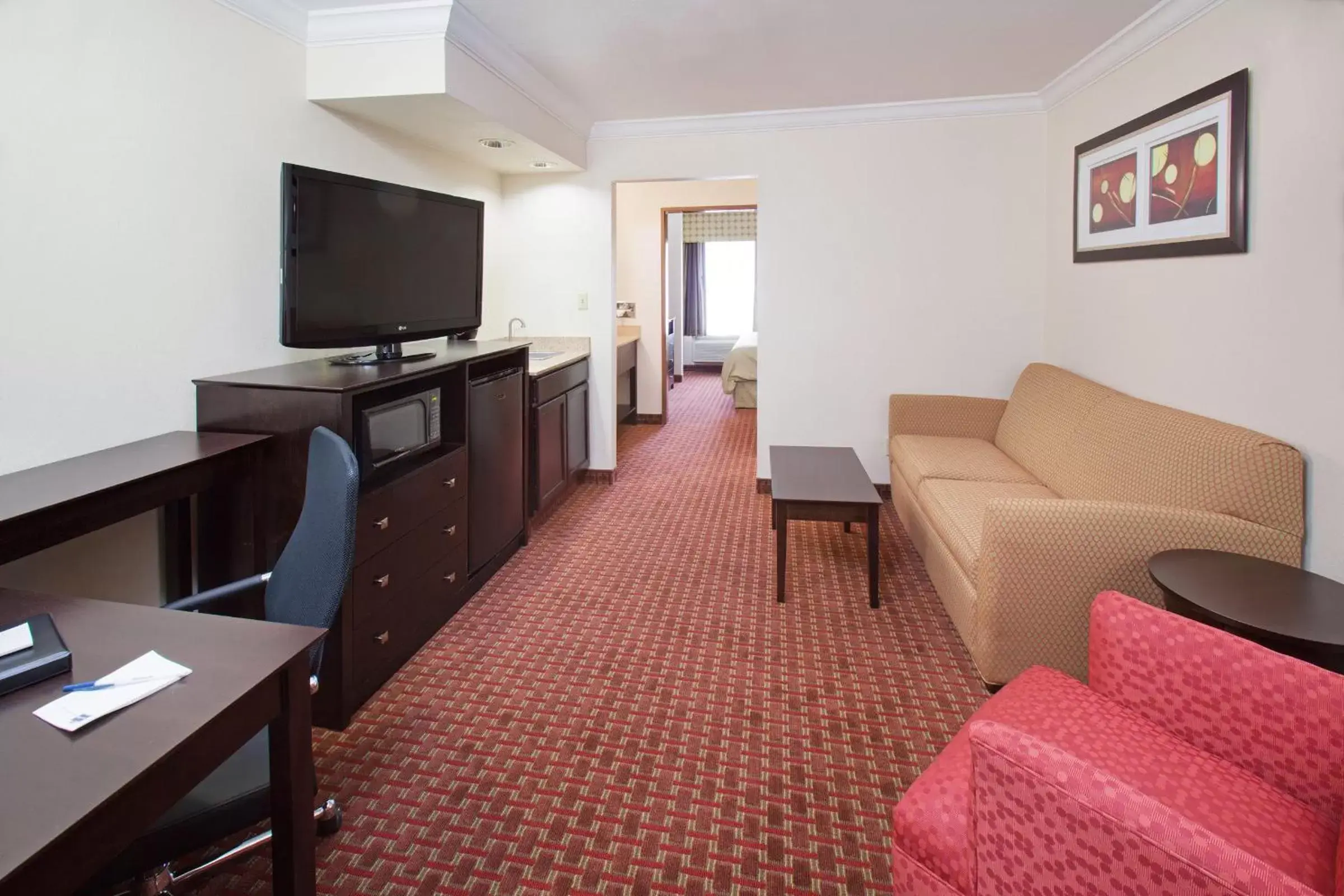 Living room, Seating Area in AmericInn by Wyndham Johnston Des Moines