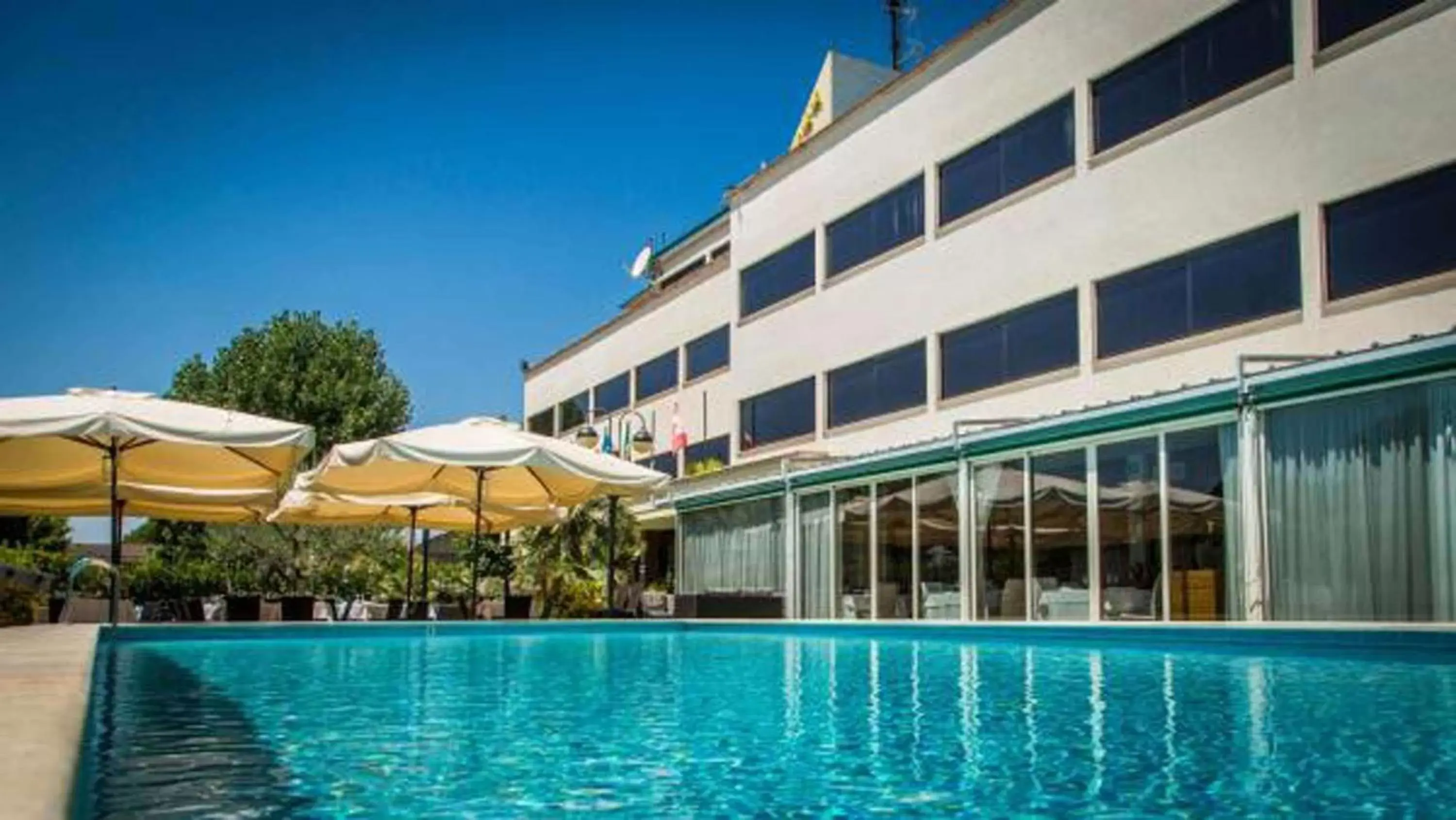 Property building, Swimming Pool in Hotel Cristallo Relais, Sure Hotel Collection By Best Western