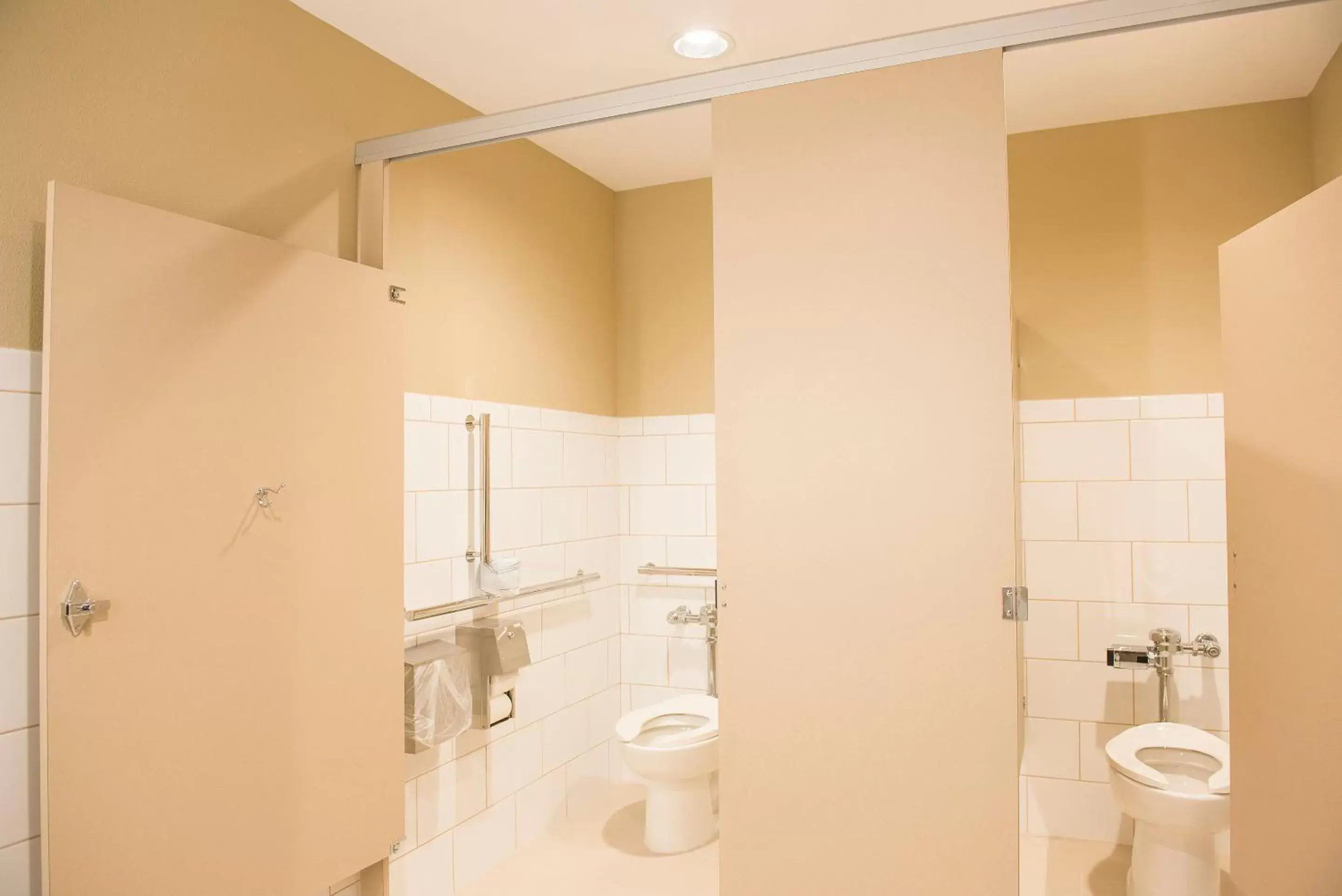 Toilet, Bathroom in Candlewood Suites Fargo South-Medical Center, an IHG Hotel