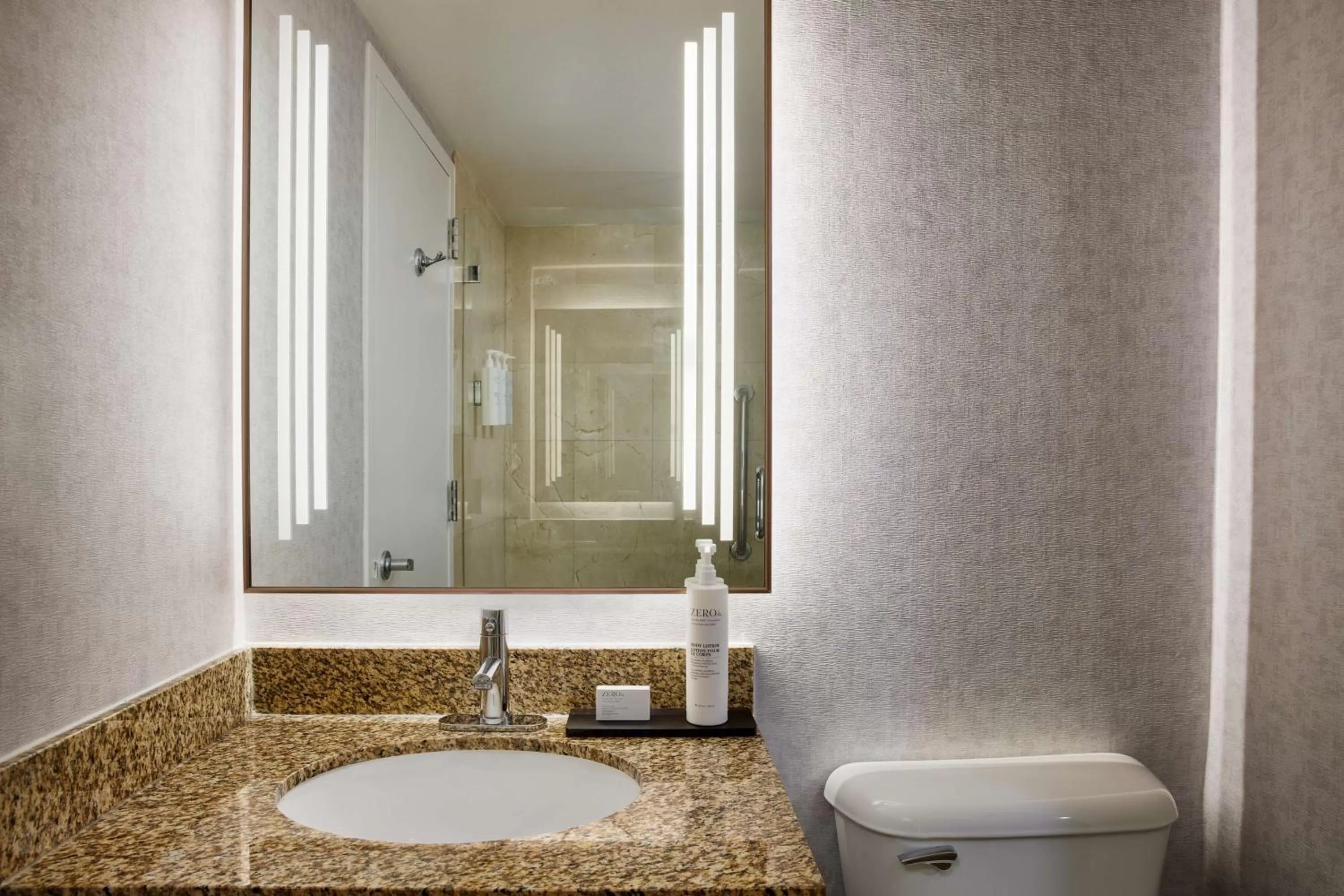 Bathroom in Embassy Suites by Hilton West Palm Beach Central