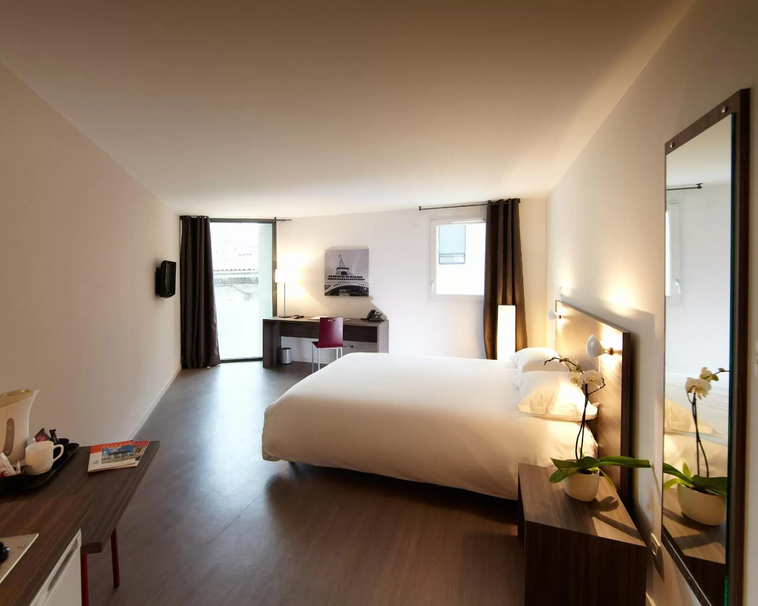 Bed in Appart’hôtel Hevea