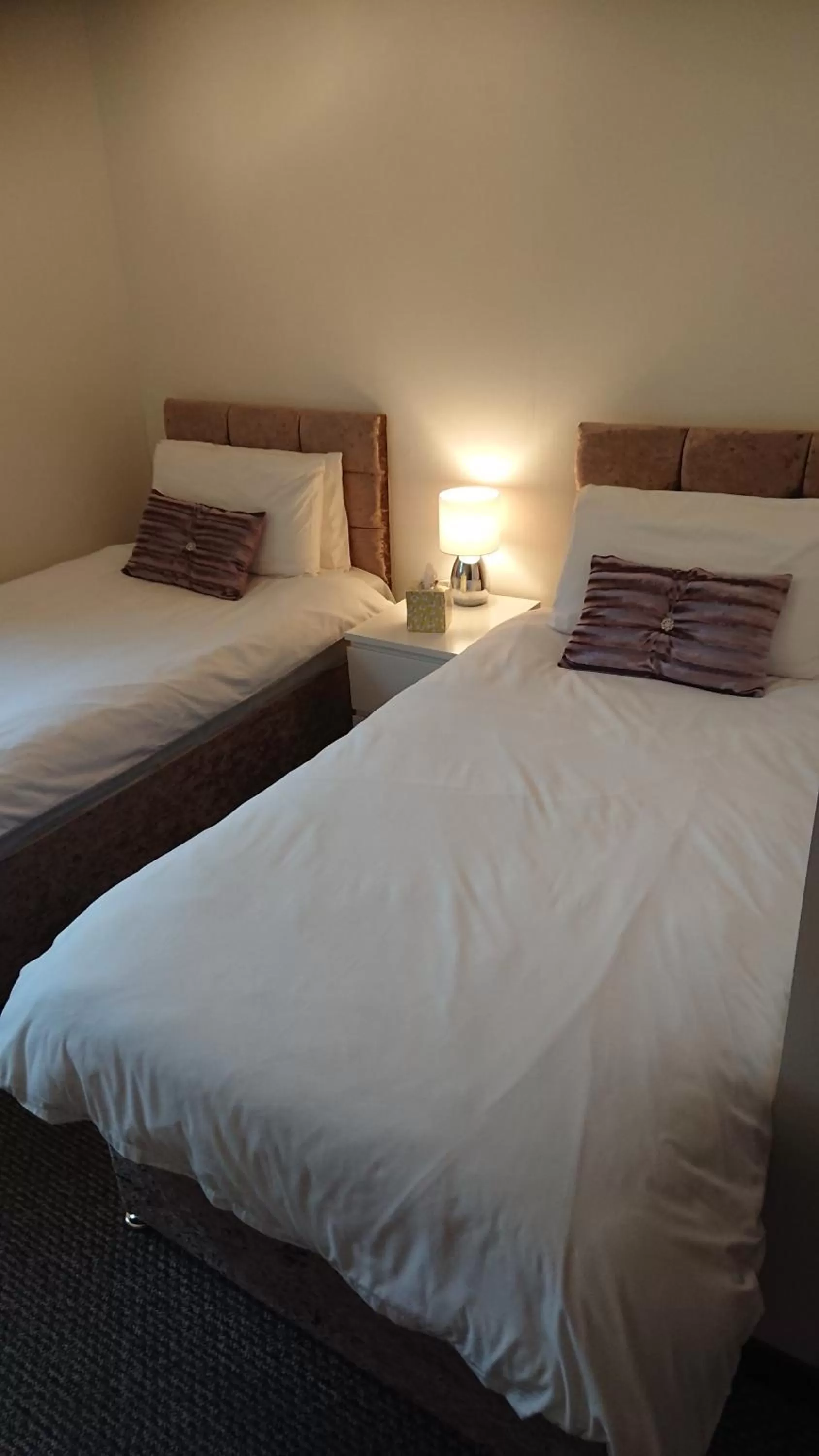 Bedroom, Bed in Glenfern Guest House and a separate Cottage with its own private hot tub