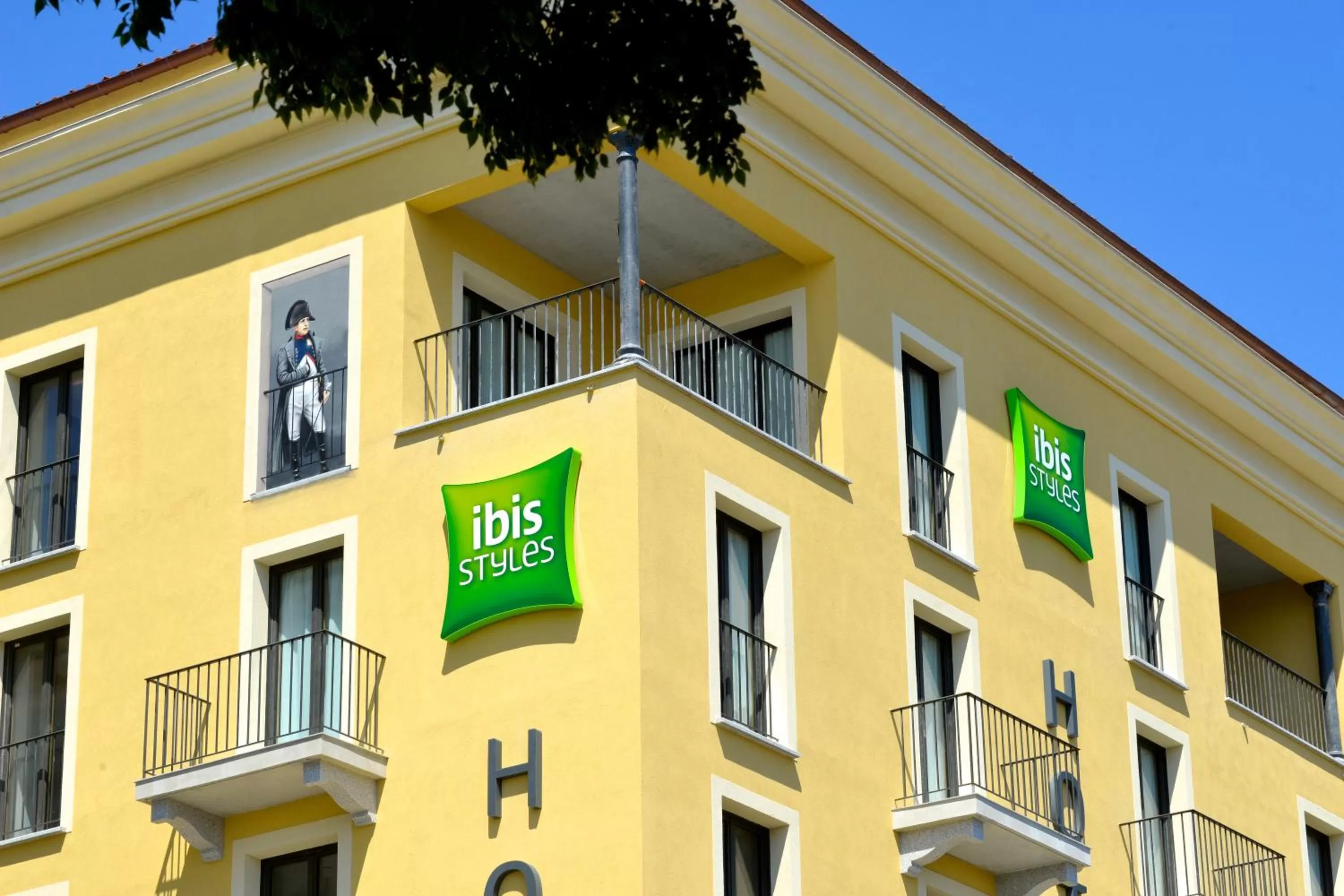 Property logo or sign in ibis Styles Ajaccio Napoleon