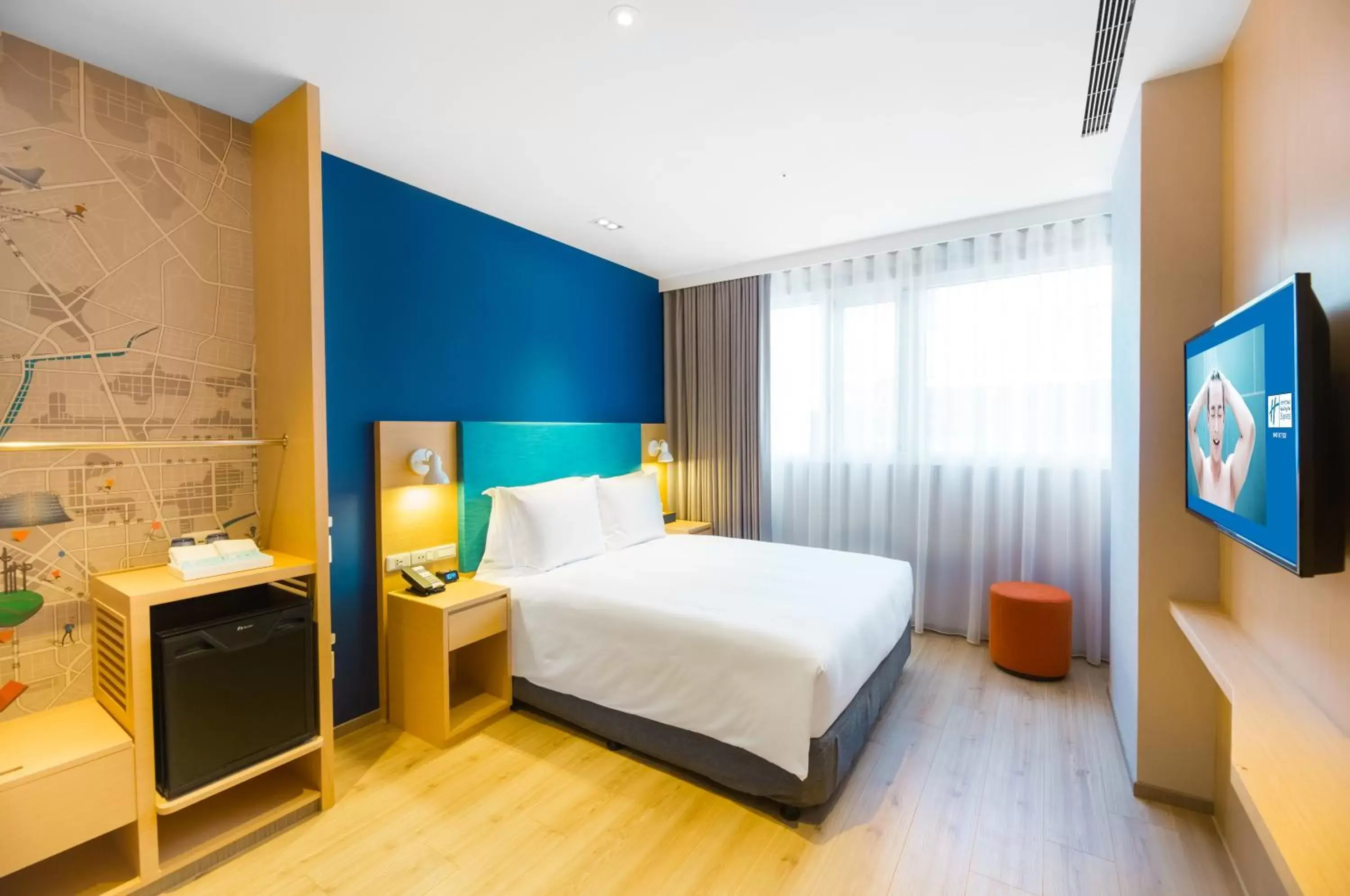 Bed in Holiday Inn Express Taichung Fengchia, an IHG Hotel