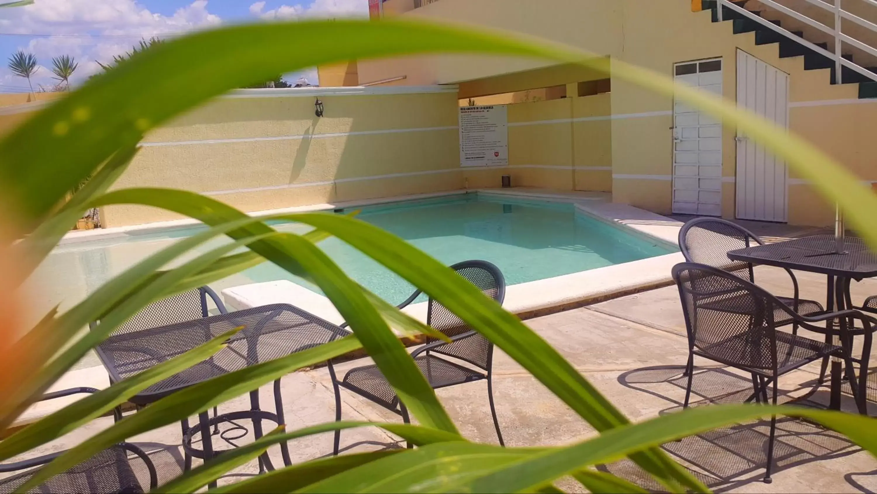 Patio, Swimming Pool in Hotel El Marques