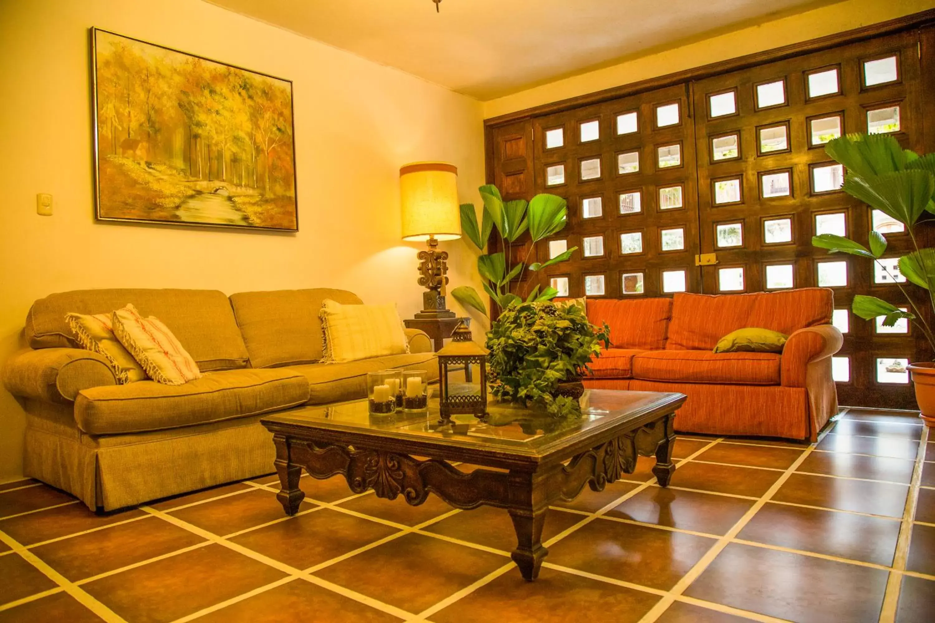 Communal lounge/ TV room, Seating Area in El Carmen Suites