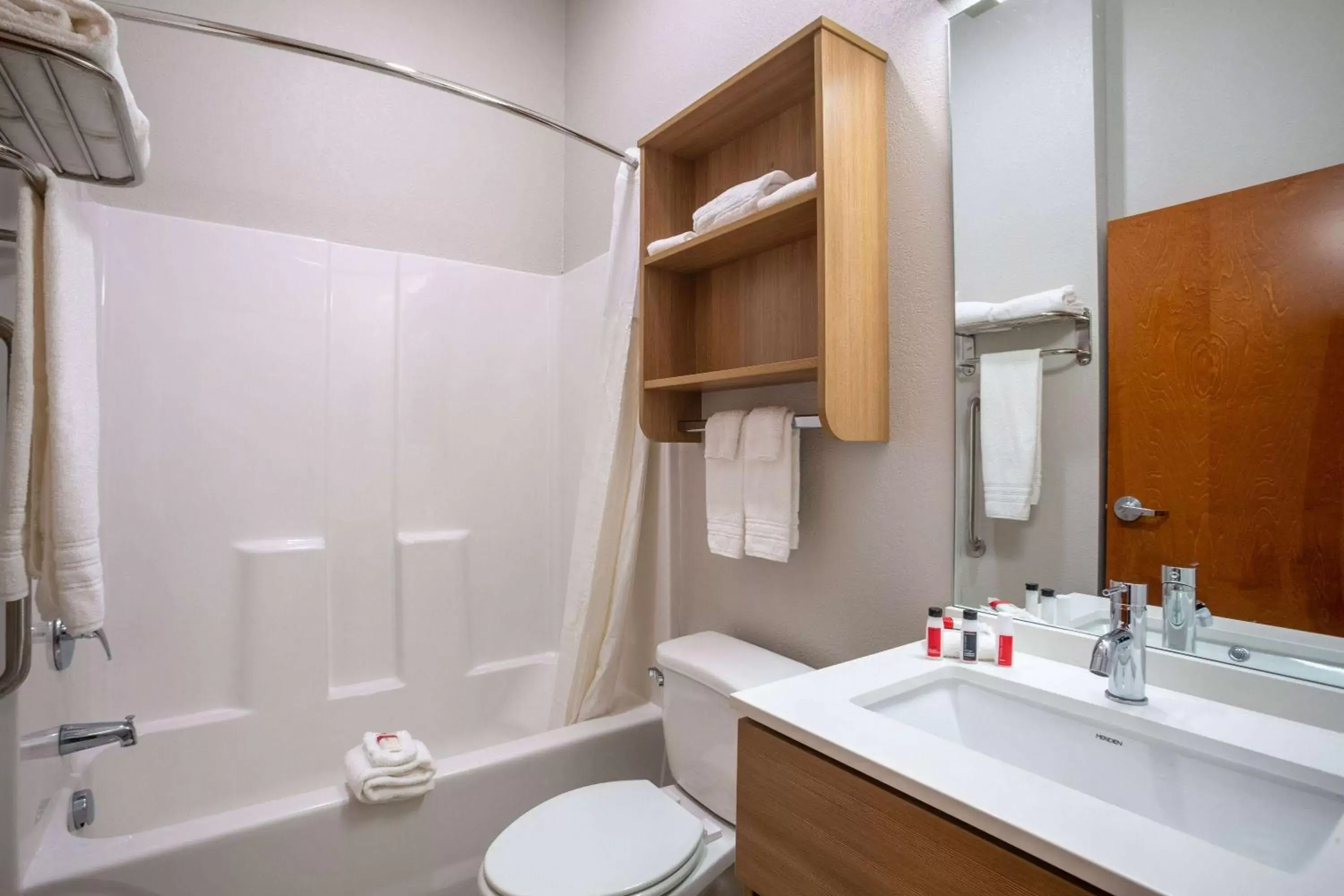 TV and multimedia, Bathroom in Microtel Inn & Suites by Wyndham Liberty NE Kansas City Area