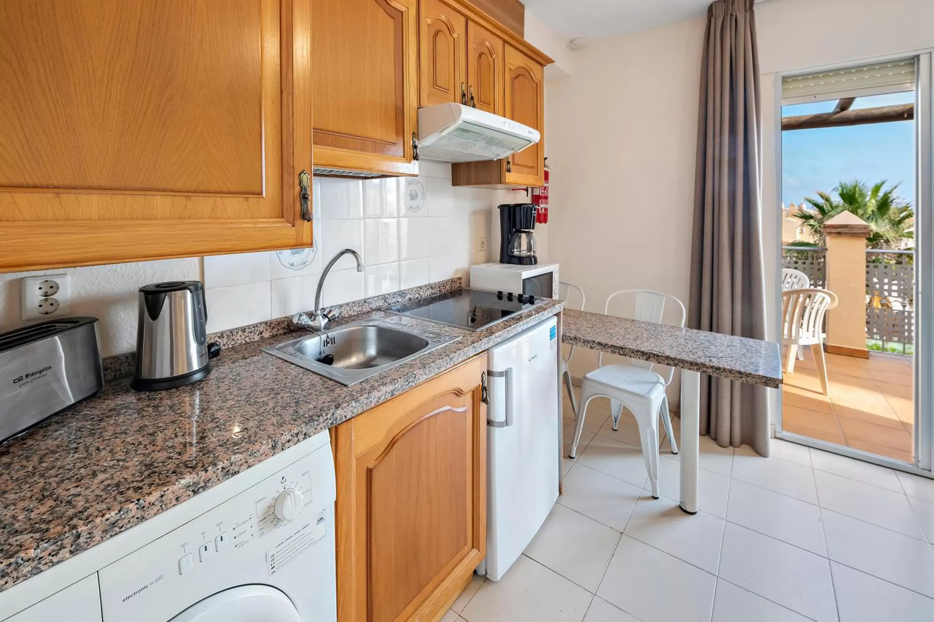 Kitchen or kitchenette, Kitchen/Kitchenette in Ramada Hotel & Suites by Wyndham Costa del Sol